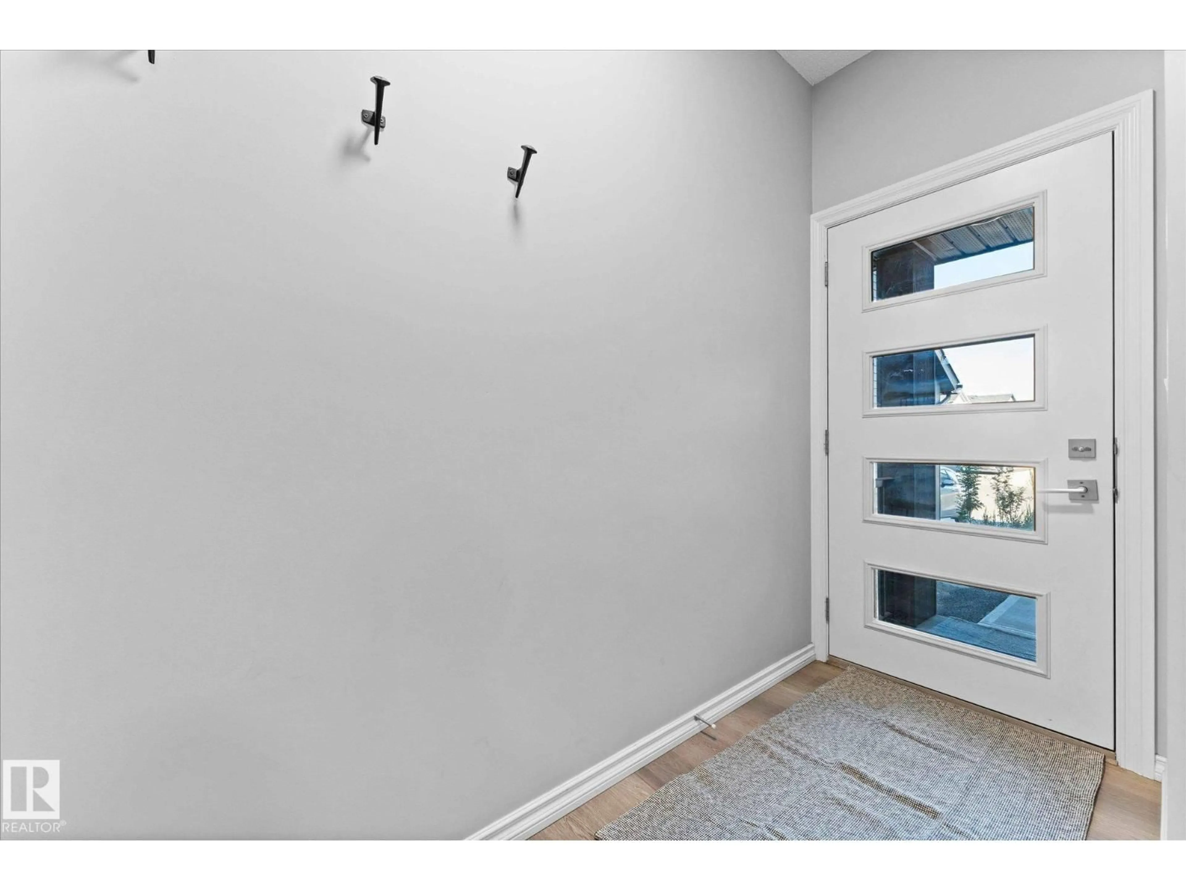 Indoor entryway for 22047 93 AV, Edmonton Alberta T5T7N9