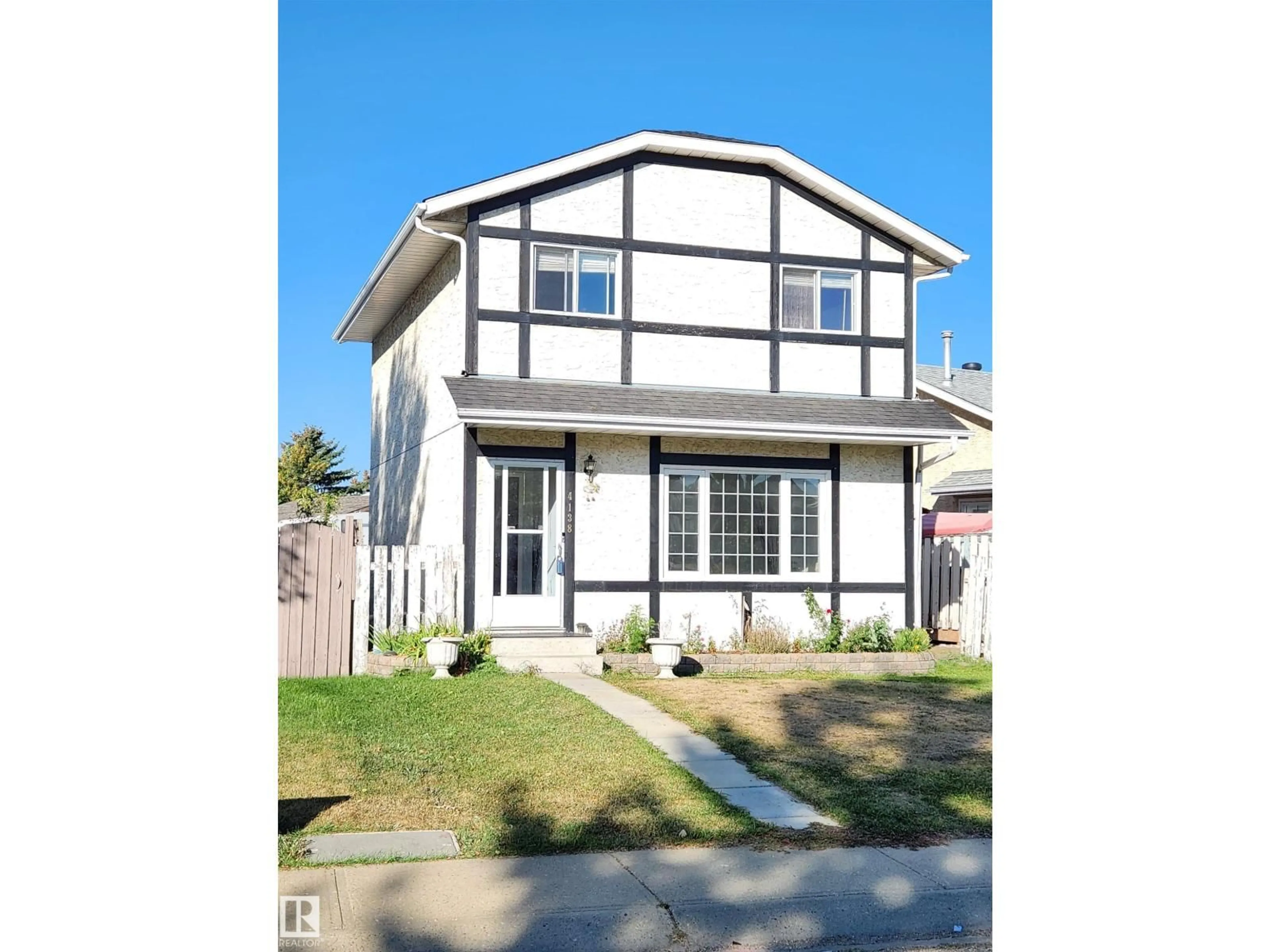 Home with vinyl exterior material, street for 4138 36 ST, Edmonton Alberta T6L5M6