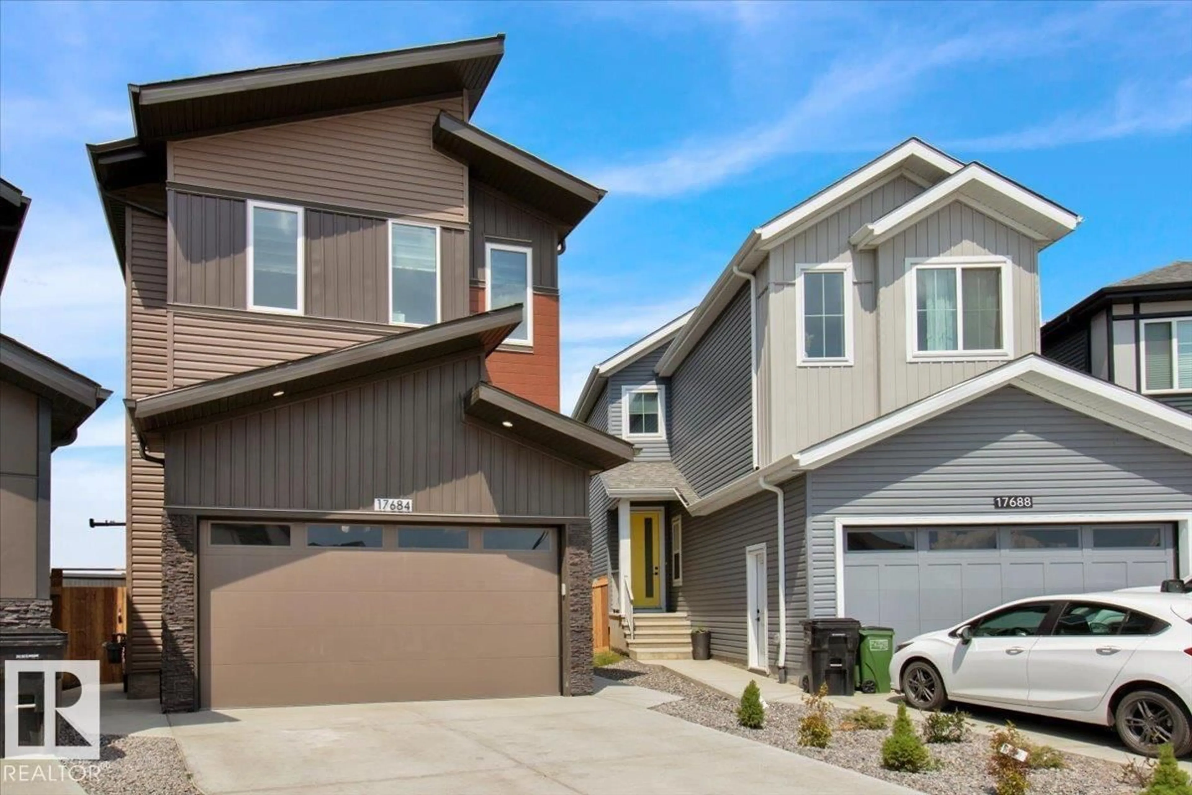 Home with vinyl exterior material, street for 17684 49 ST NW, Edmonton Alberta T5Y3Y1