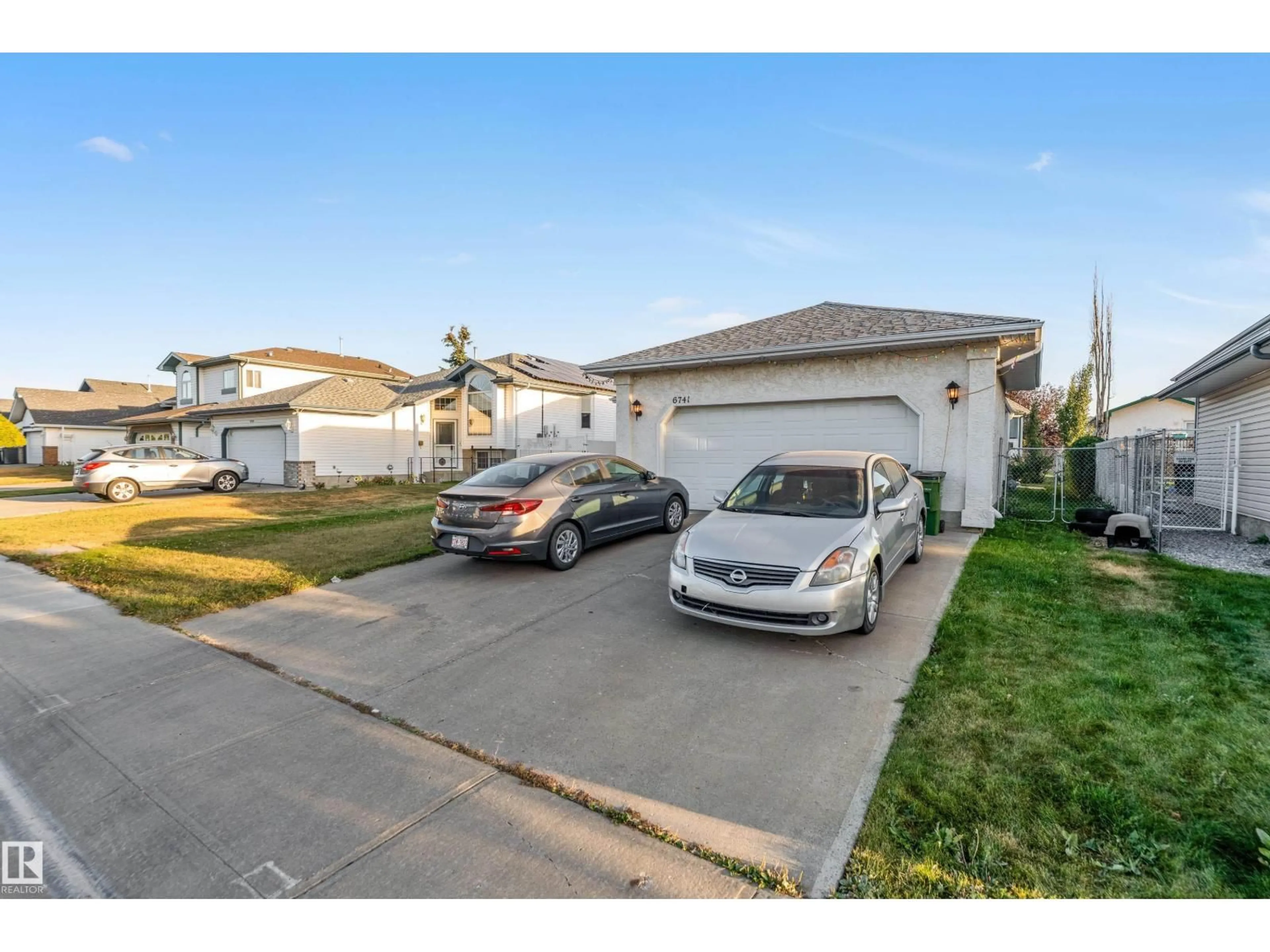 A pic from outside/outdoor area/front of a property/back of a property/a pic from drone, street for 6741 162A AV, Edmonton Alberta T5Z3C6