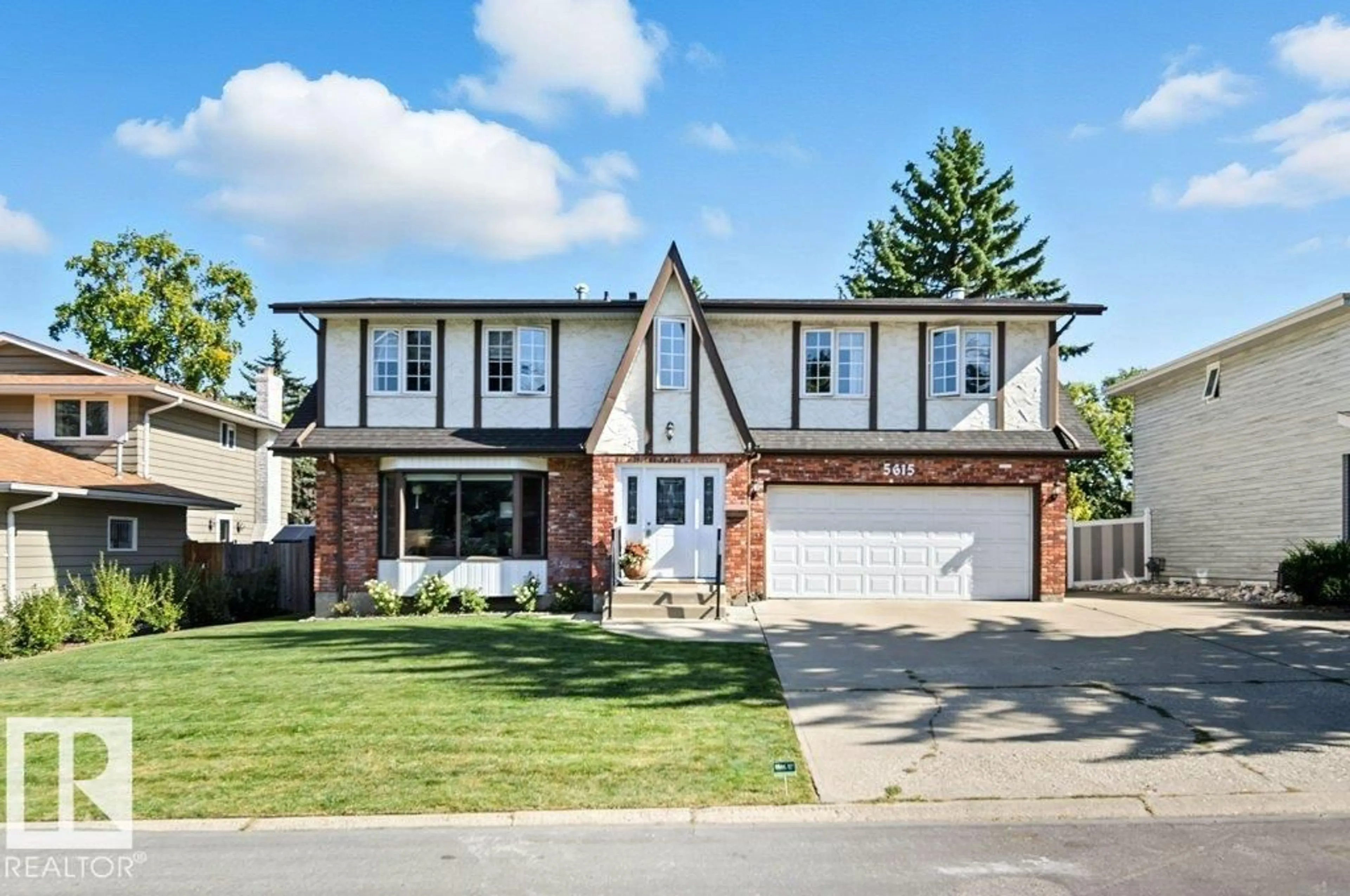 Home with brick exterior material, street for NW - 5615 151 ST, Edmonton Alberta T6H4Y6