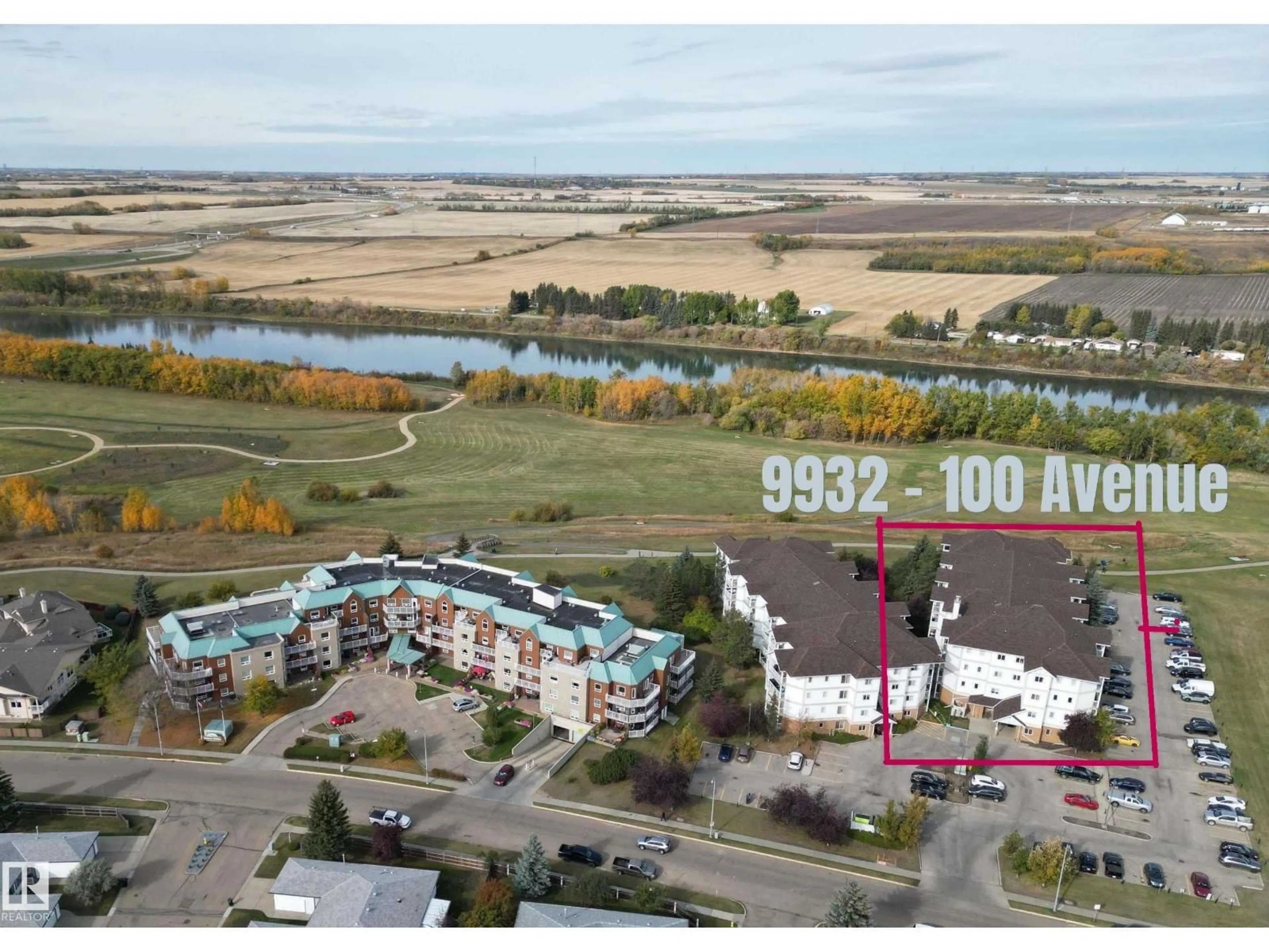 A pic from outside/outdoor area/front of a property/back of a property/a pic from drone, water/lake/river/ocean view for 110 9932 100 AV, Fort Saskatchewan Alberta T8L4P3