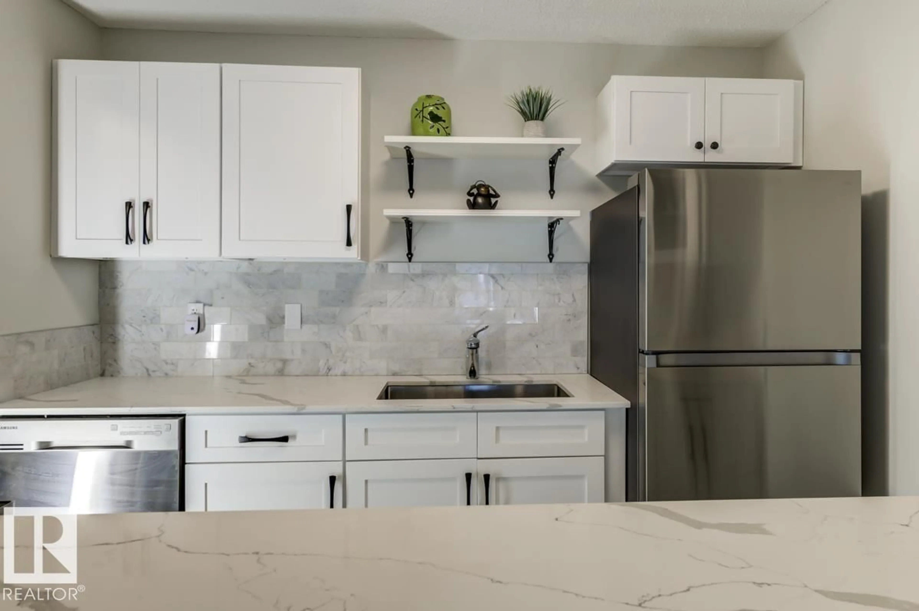 Open concept kitchen, ceramic/tile floor for 105 - 10620 104 ST NW, Edmonton Alberta T5H2W2