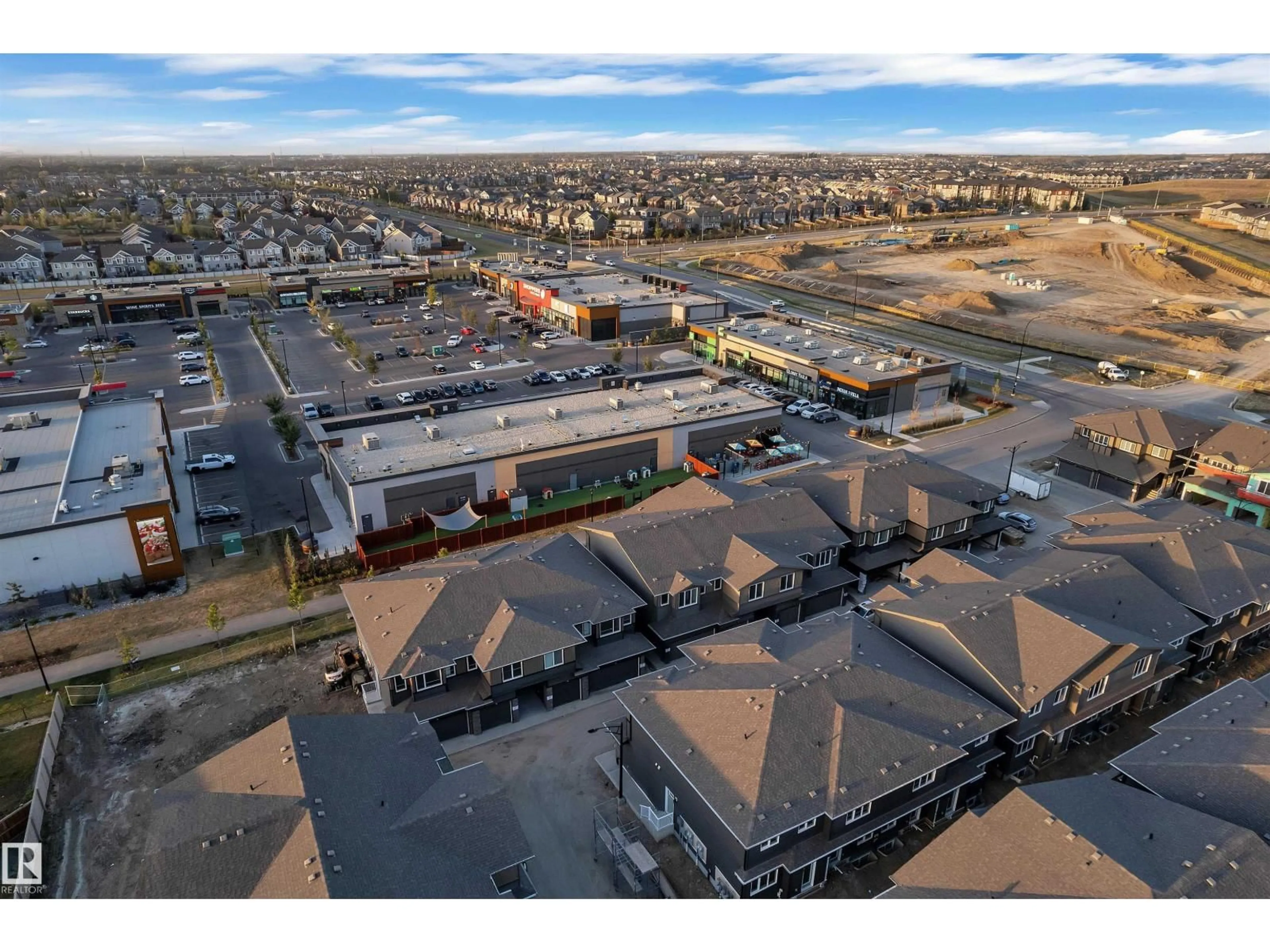 A pic from outside/outdoor area/front of a property/back of a property/a pic from drone, street for 69 - 2710 66 STREET, Edmonton Alberta T6X3H4