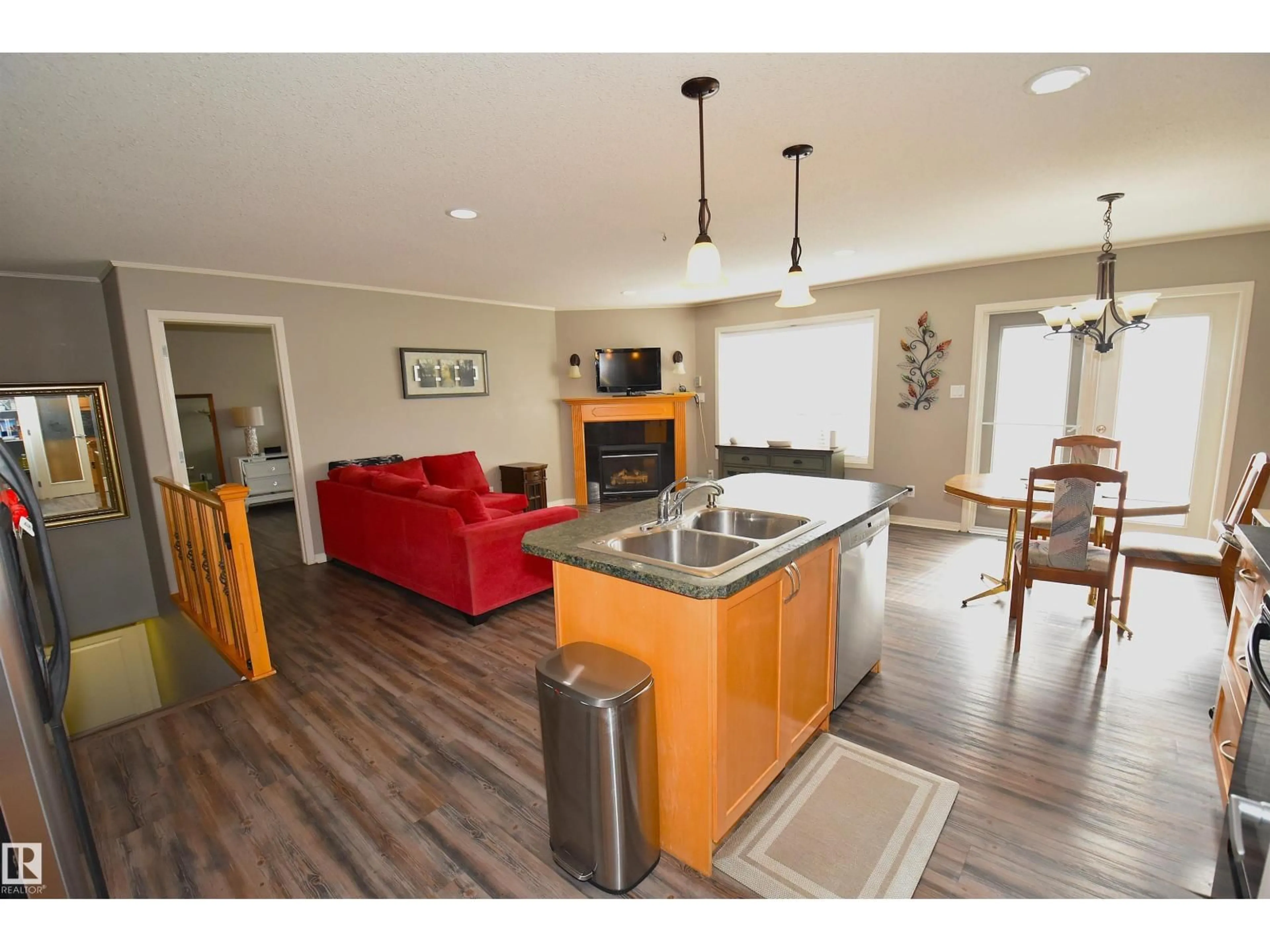 Open concept kitchen, wood/laminate floor for 4353 48A AV, Onoway Alberta T0E1V0