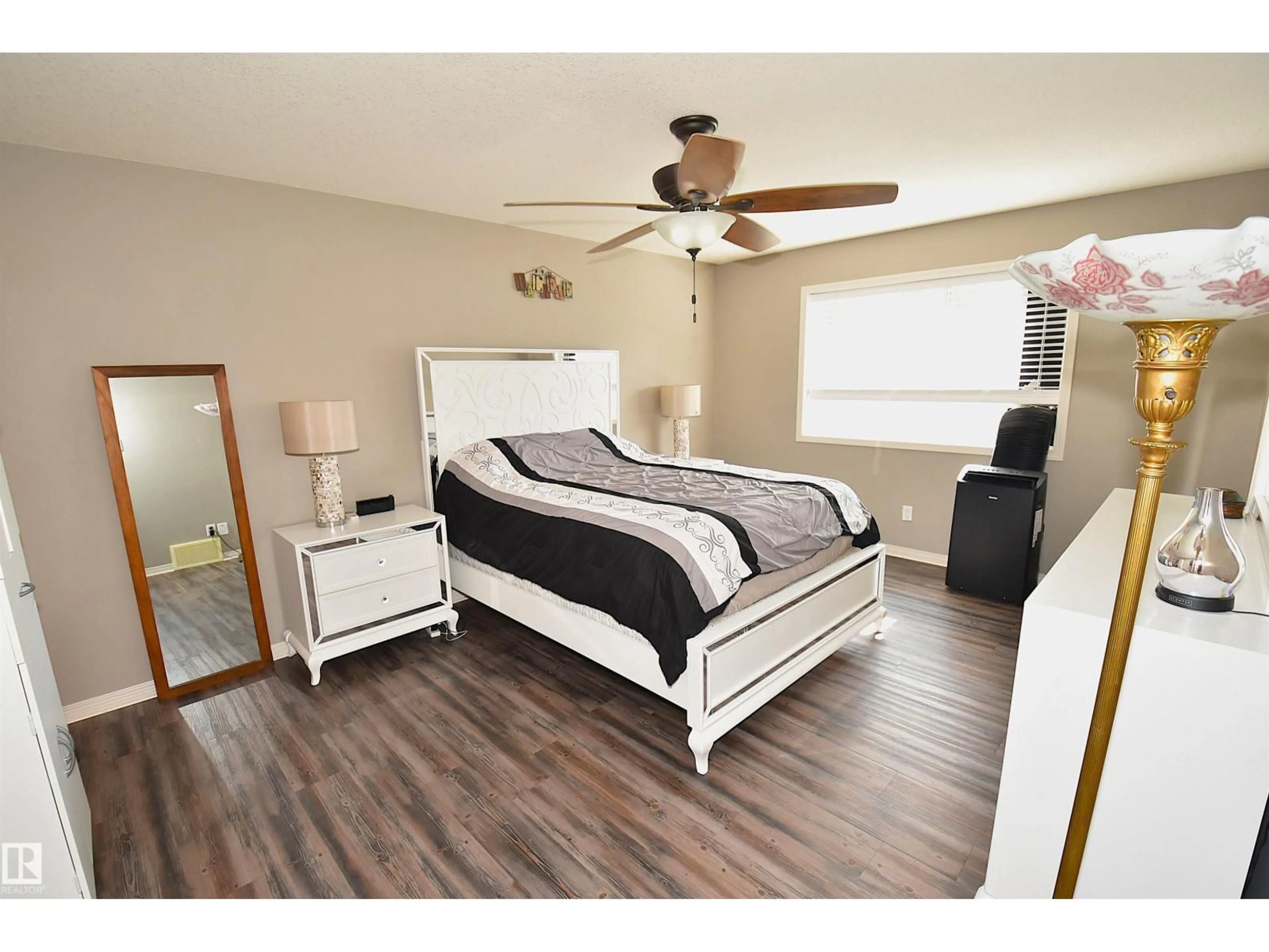 Bedroom with bed, wood/laminate floor for 4353 48A AV, Onoway Alberta T0E1V0