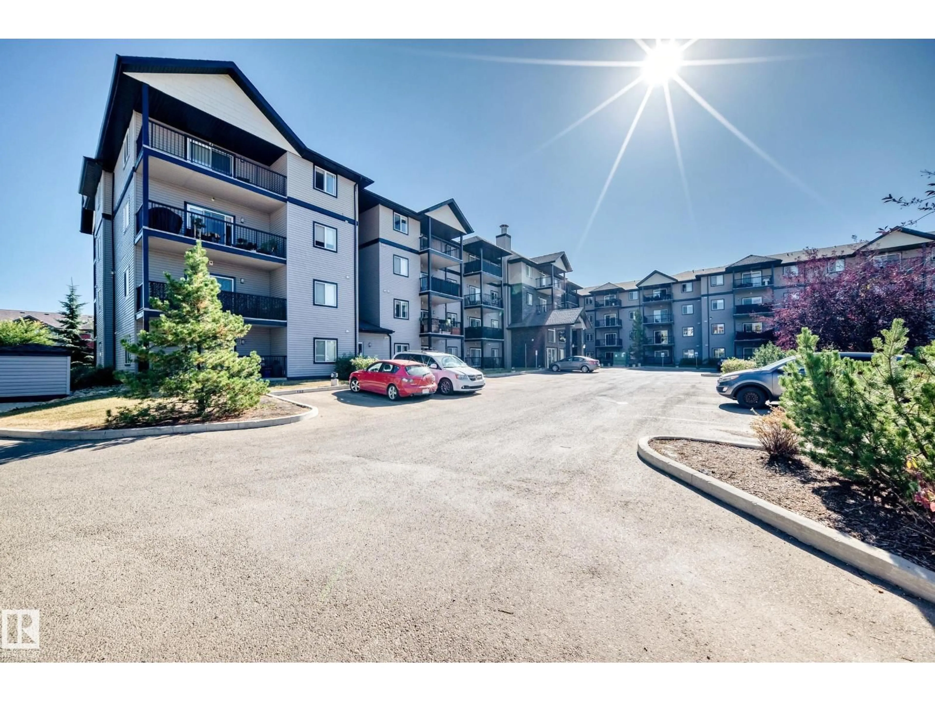 A pic from outside/outdoor area/front of a property/back of a property/a pic from drone, water/lake/river/ocean view for 220 14808 125 ST NW, Edmonton Alberta T5X0G1