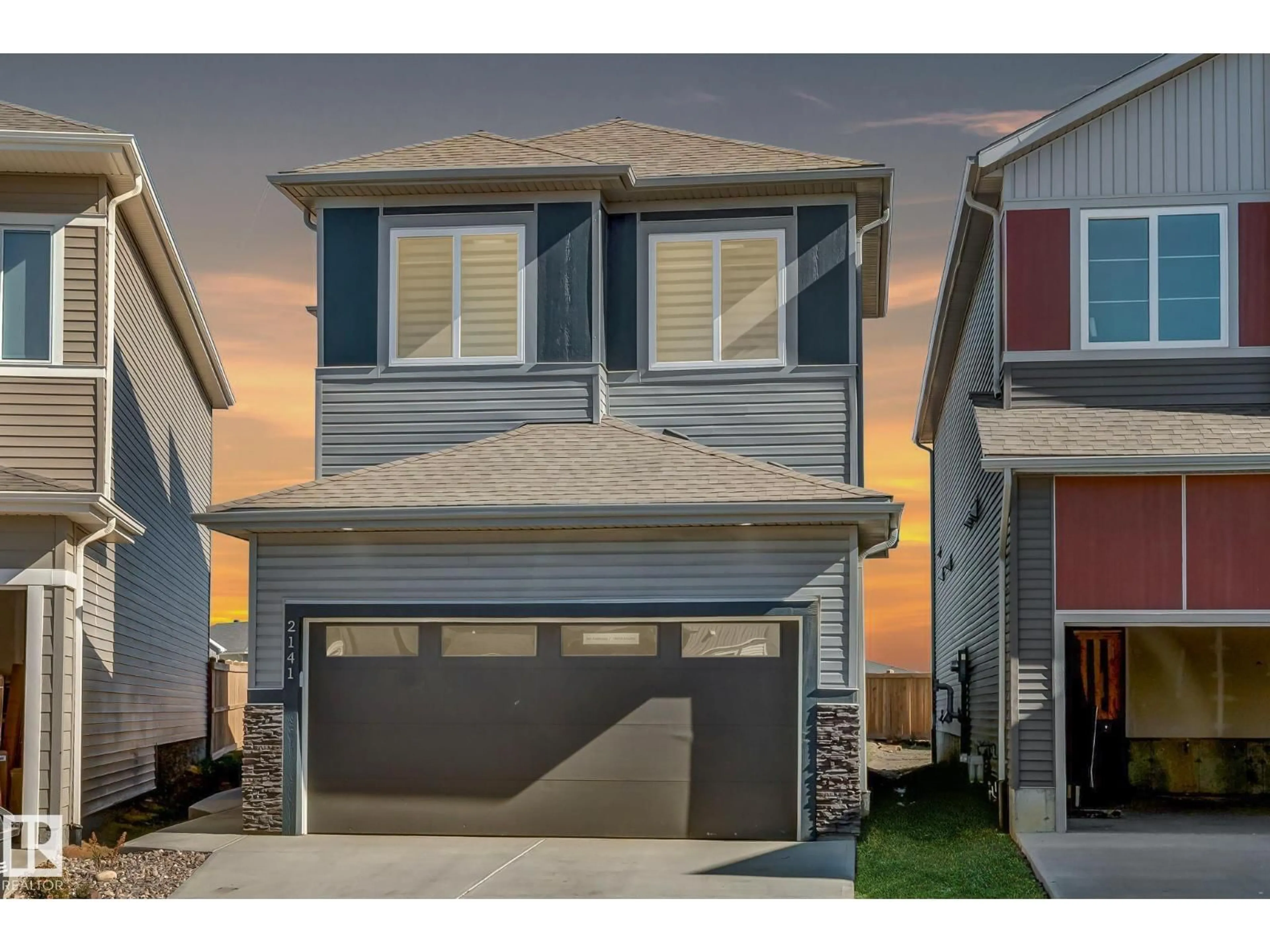 Home with vinyl exterior material, street for NW - 2141 209A ST, Edmonton Alberta T6M3C7