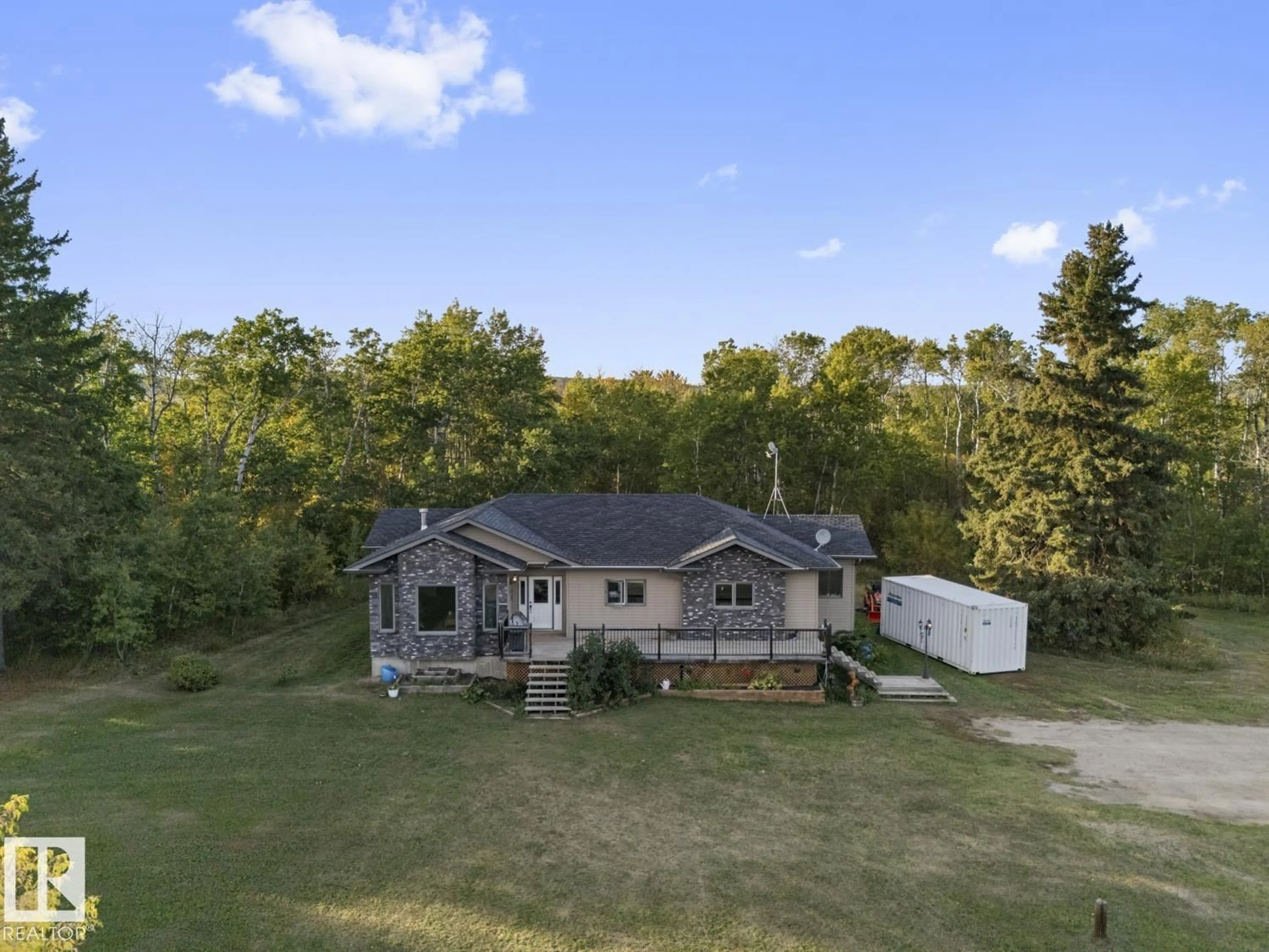 A pic from outside/outdoor area/front of a property/back of a property/a pic from drone, unknown for 45010 TWP RD 631, Rural Bonnyville M.D. Alberta T9N2J7