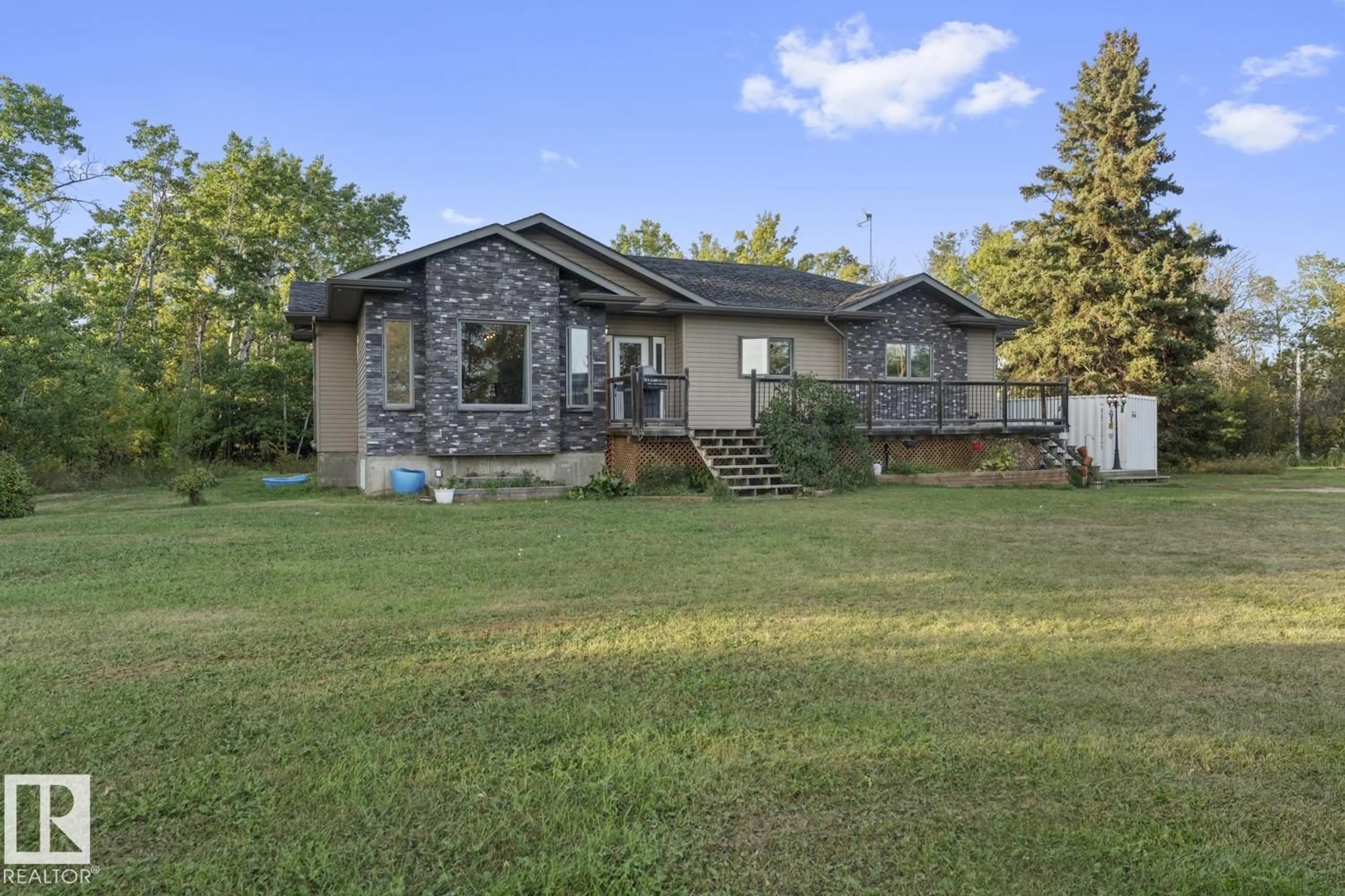 A pic from outside/outdoor area/front of a property/back of a property/a pic from drone, unknown for 45010 TWP RD 631, Rural Bonnyville M.D. Alberta T9N2J7