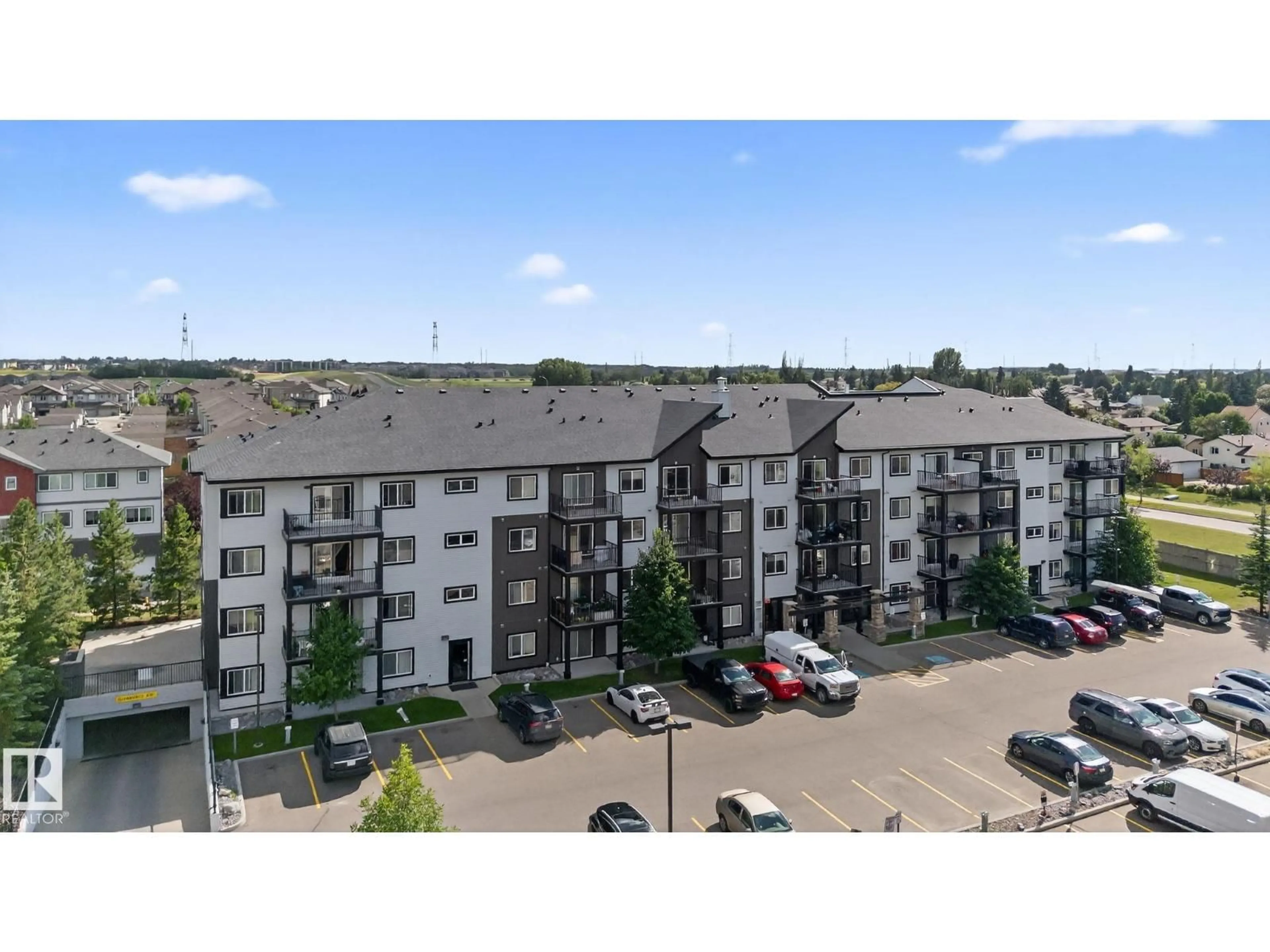 A pic from outside/outdoor area/front of a property/back of a property/a pic from drone, unknown for 209 - 3353 16A NW, Edmonton Alberta T6T0V4