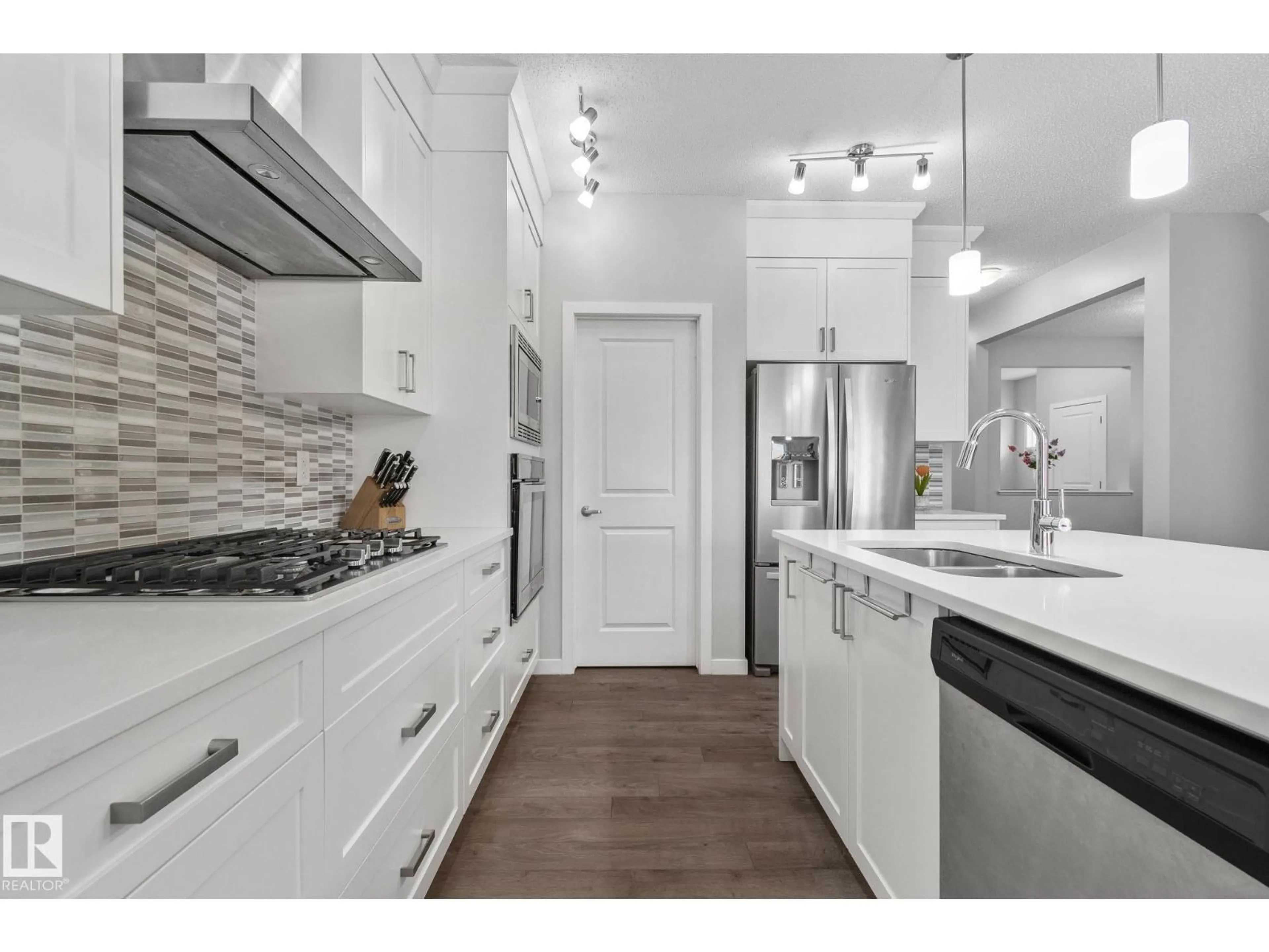 Open concept kitchen, unknown for NW - 17611 76 ST, Edmonton Alberta T5Z0R3