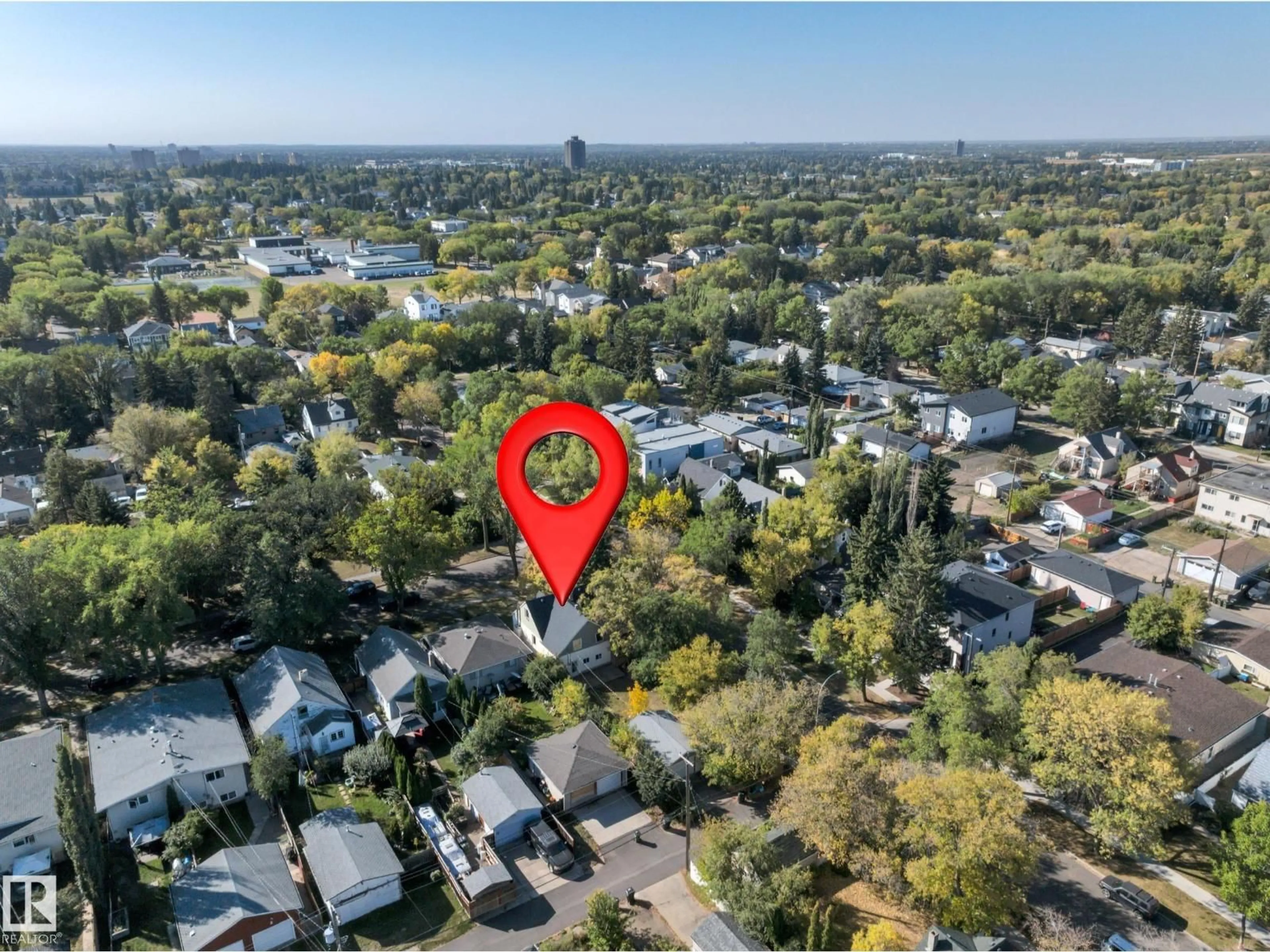 A pic from outside/outdoor area/front of a property/back of a property/a pic from drone, street for 10542 68 AV, Edmonton Alberta T6H2B1