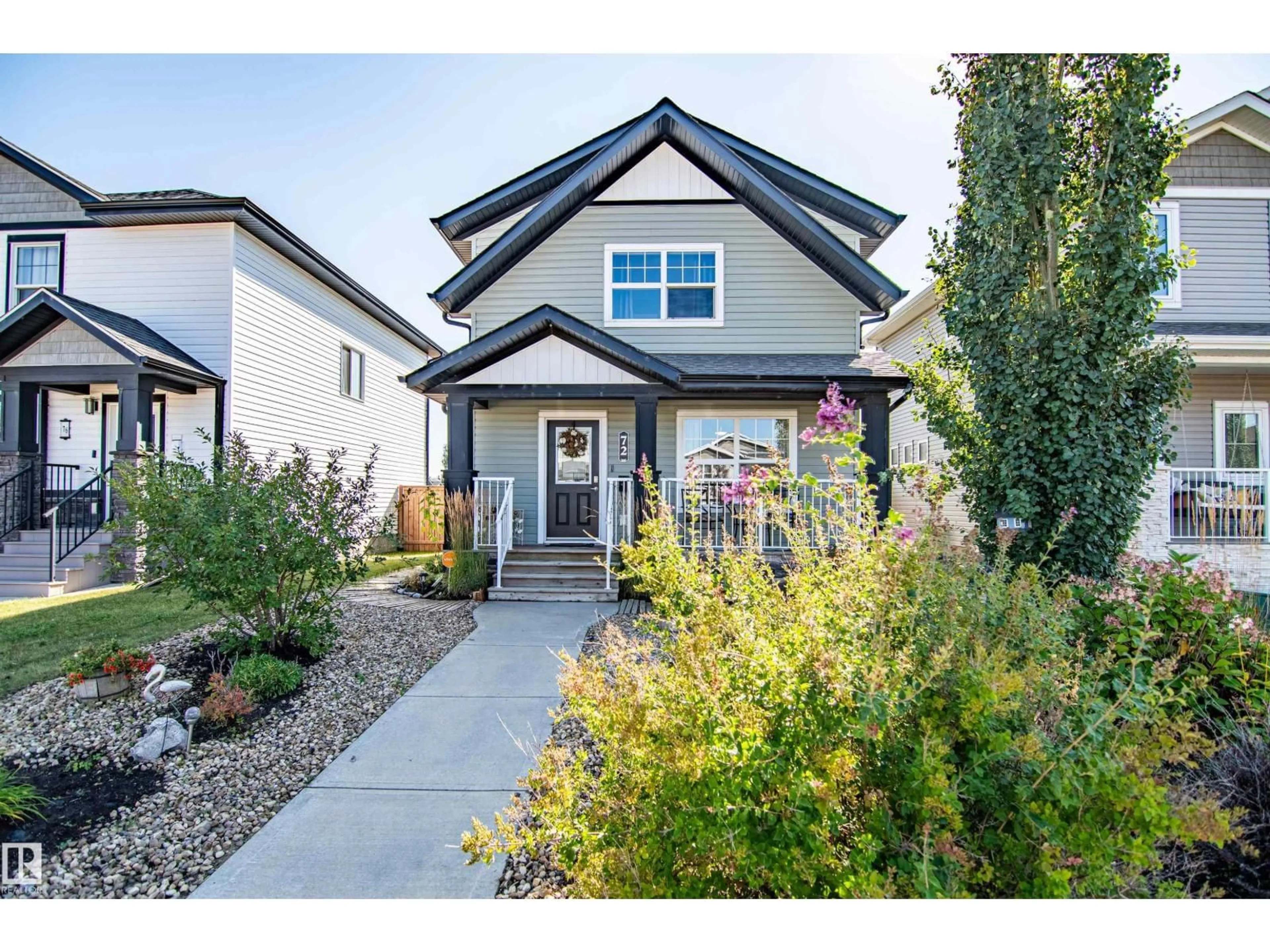 Home with vinyl exterior material, street for 72 ALMOND CRESCENT, Blackfalds Alberta T4M0J6