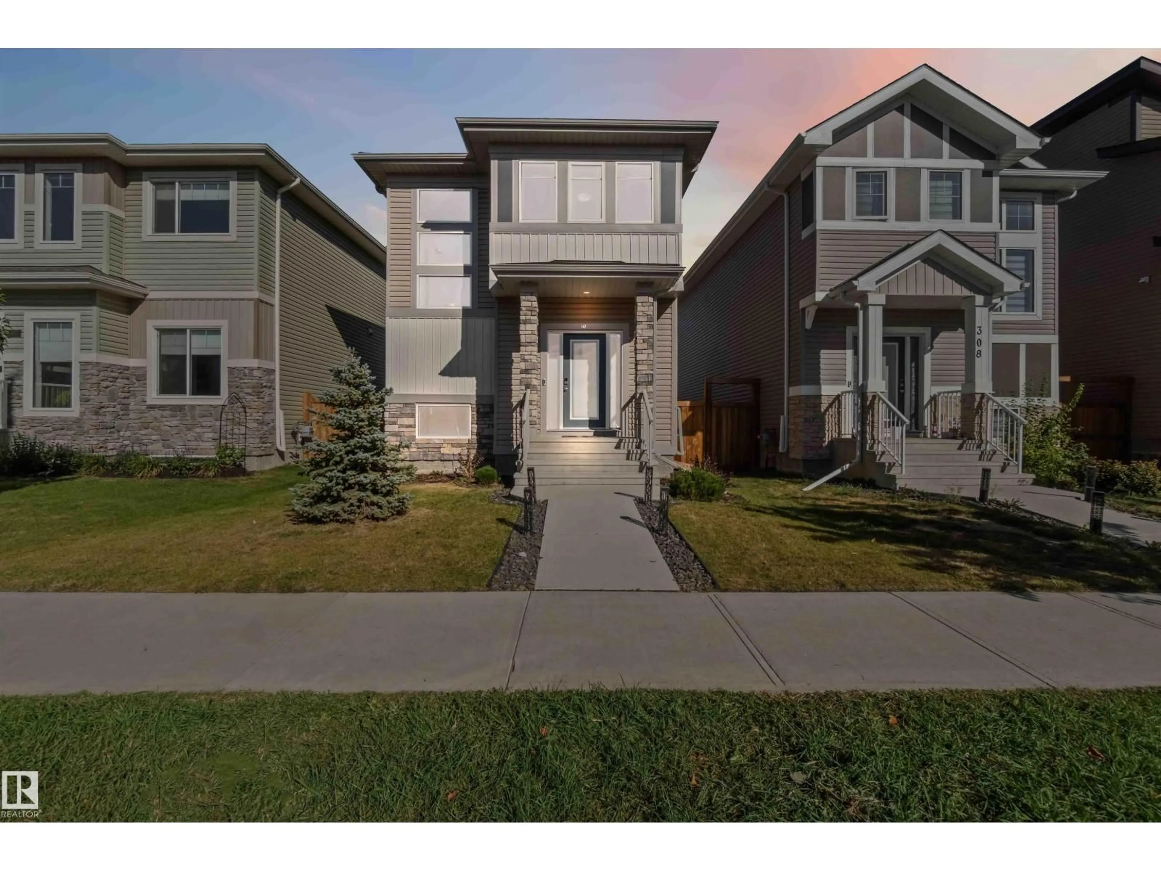 Home with vinyl exterior material, street for 310 BALSAM LI, Leduc Alberta T9E1L2