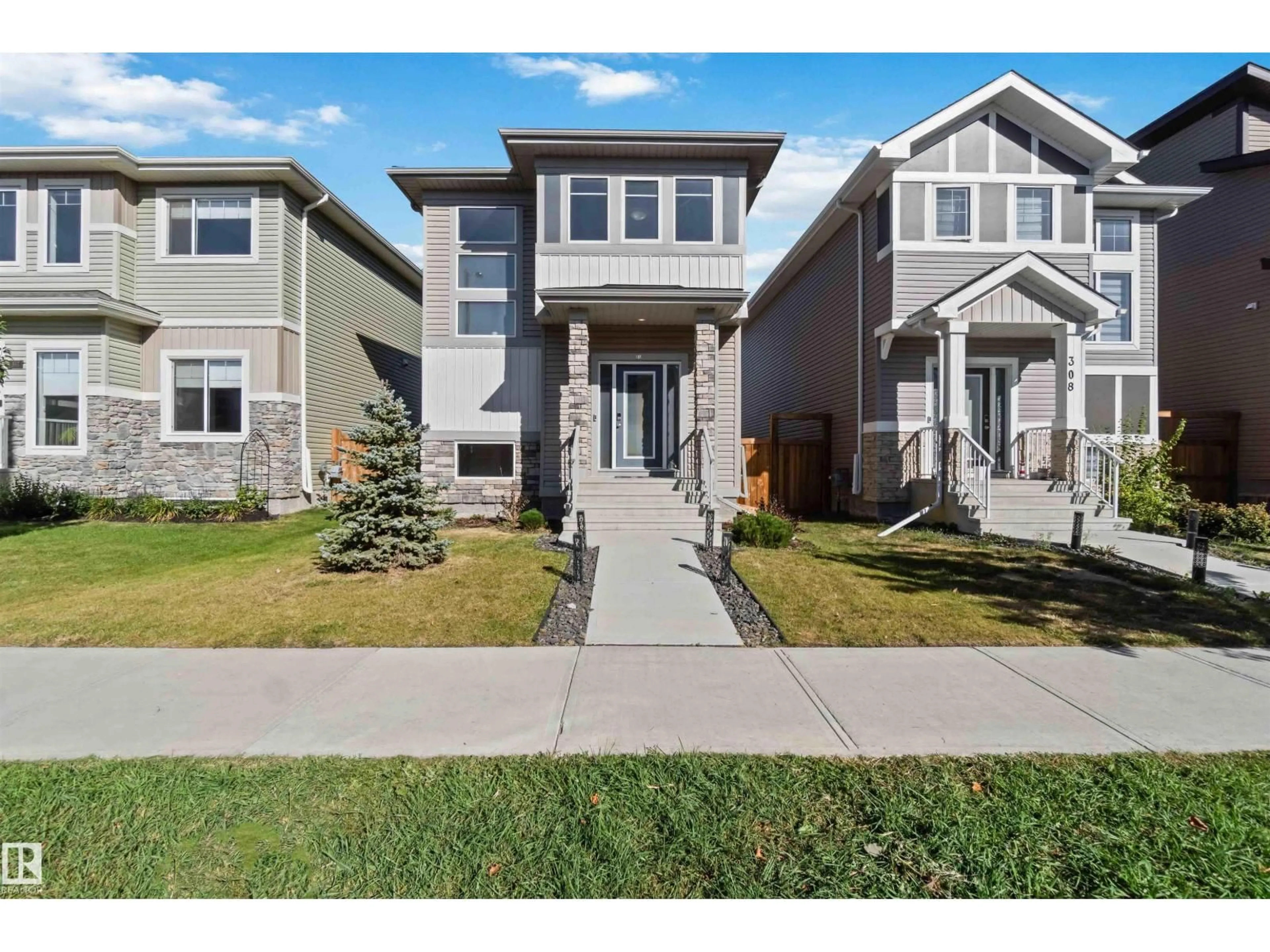 Home with vinyl exterior material, street for 310 BALSAM LI, Leduc Alberta T9E1L2