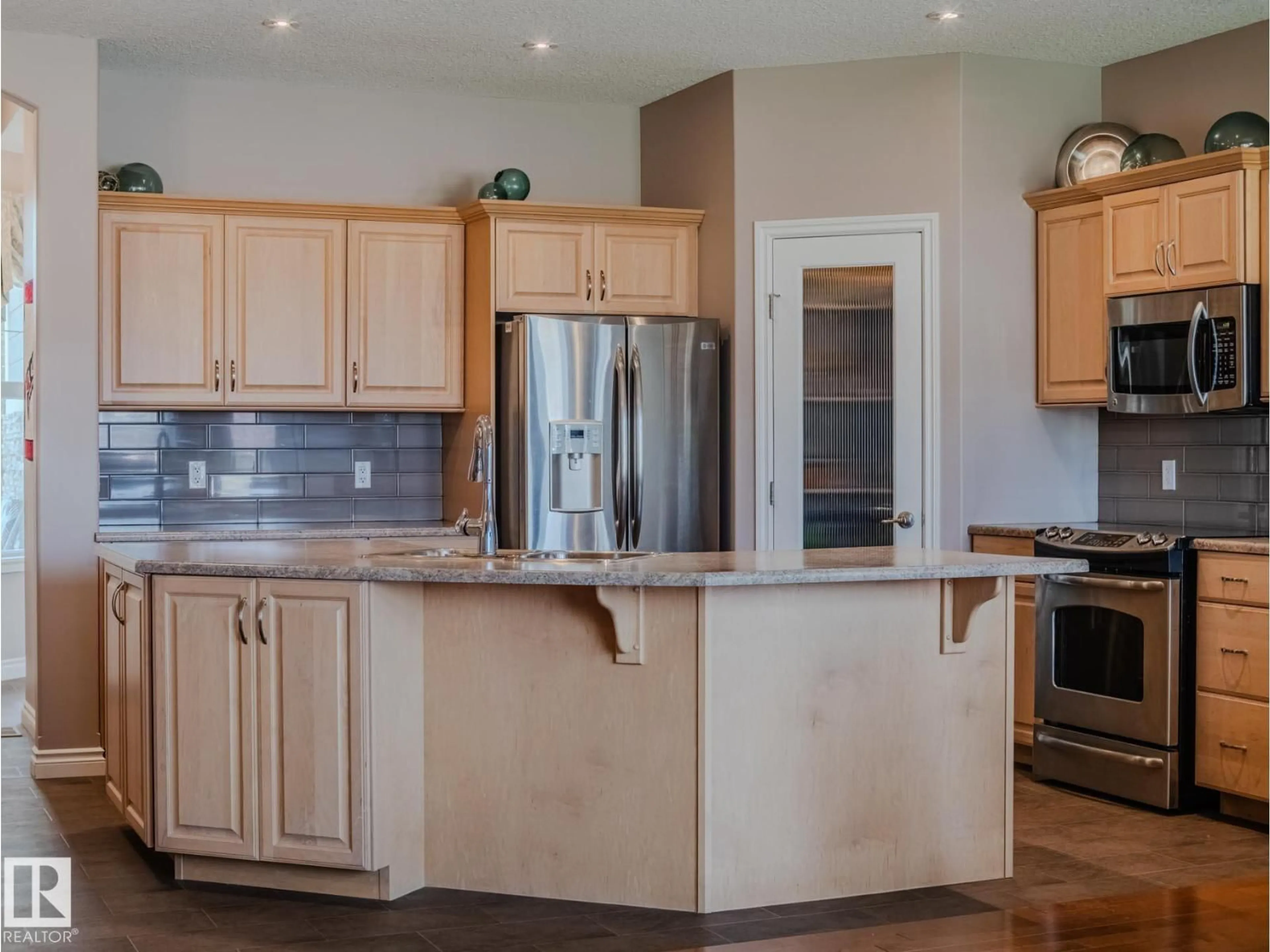 Open concept kitchen, unknown for 5 - 18343 LESSARD RD, Edmonton Alberta T6M0A2