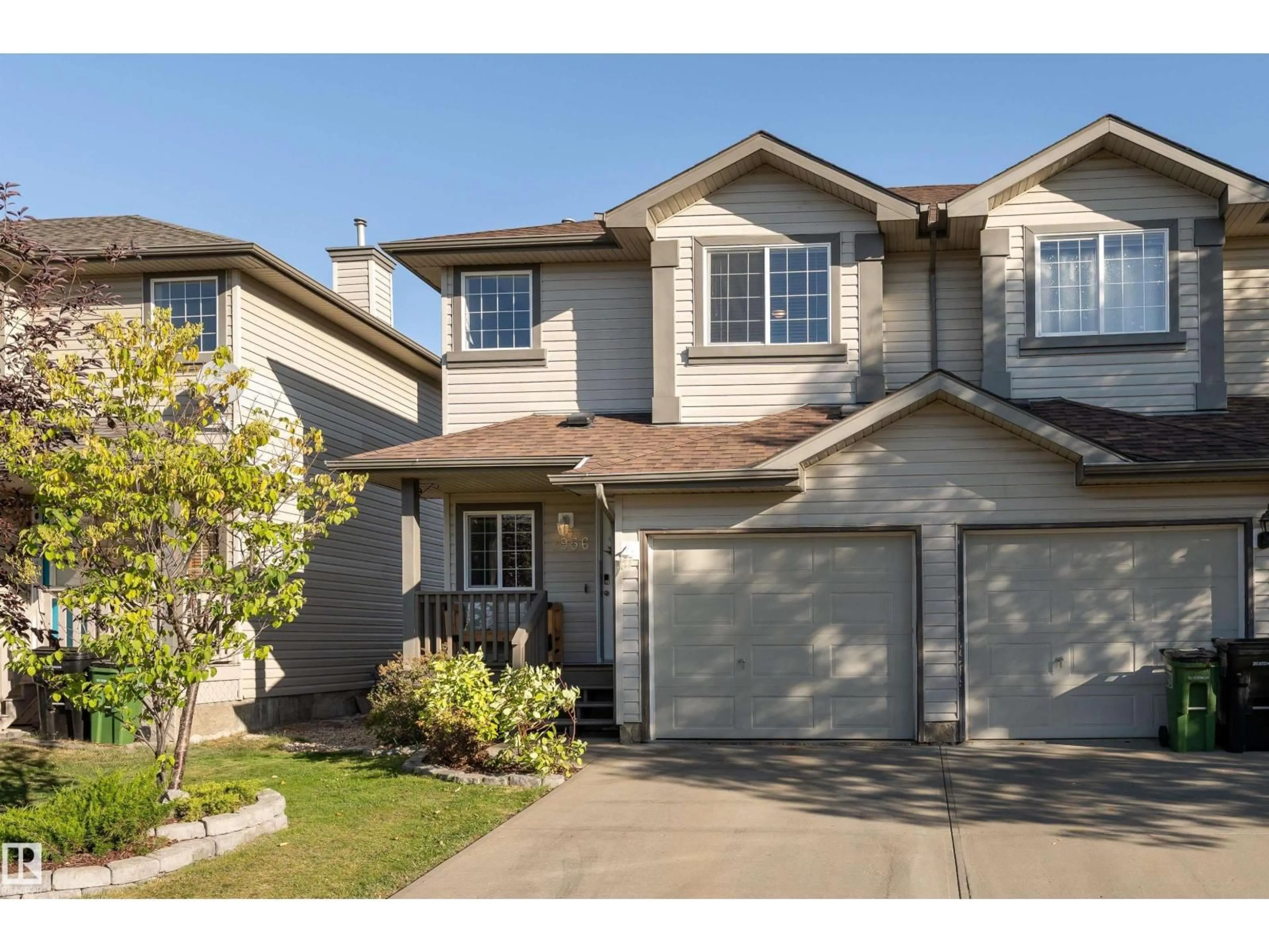 Home with vinyl exterior material, street for SW - 7956 2 AV, Edmonton Alberta T6X1K7