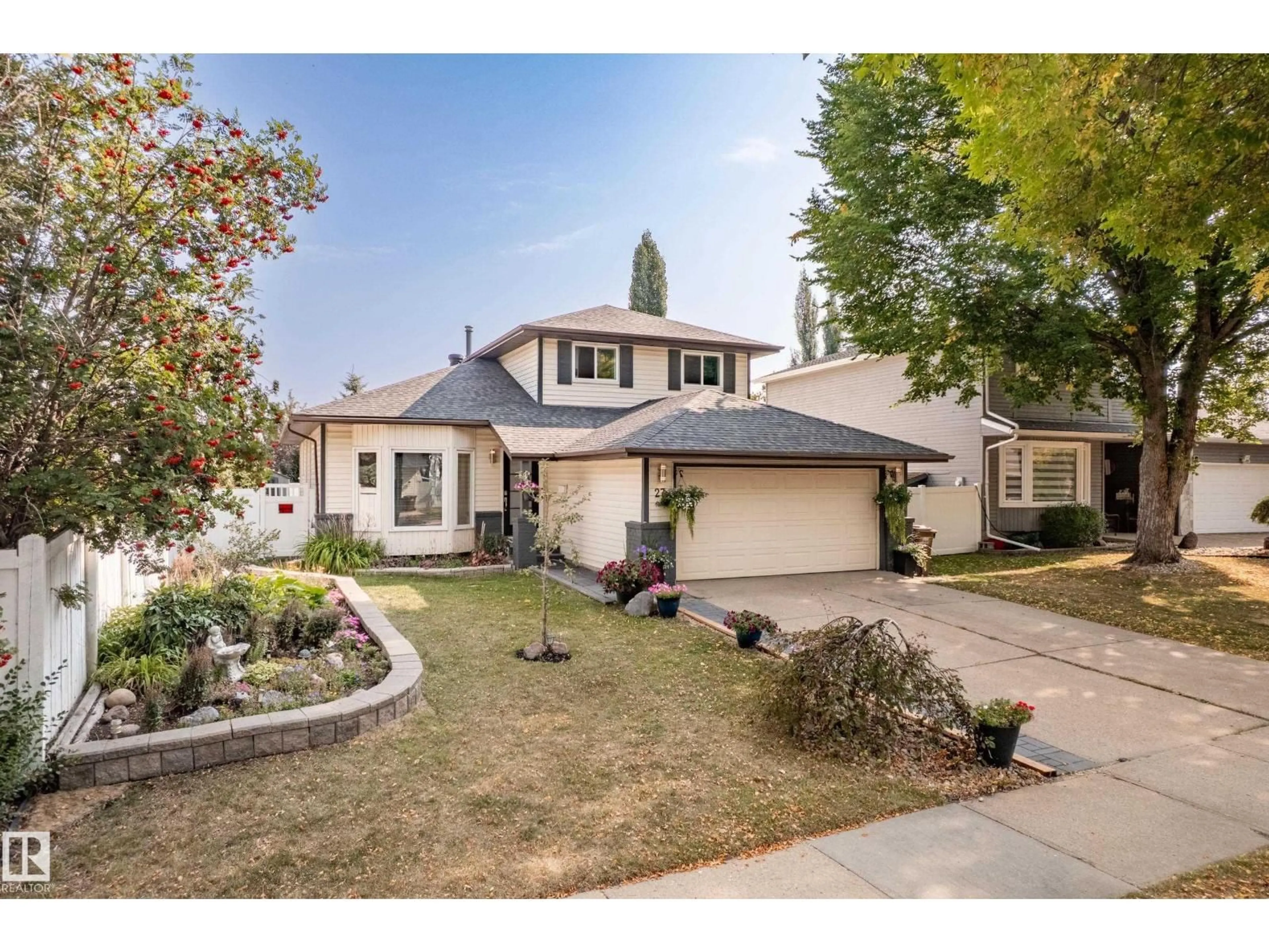 Home with vinyl exterior material, street for 27 PAGE DR, St. Albert Alberta T8N4S8