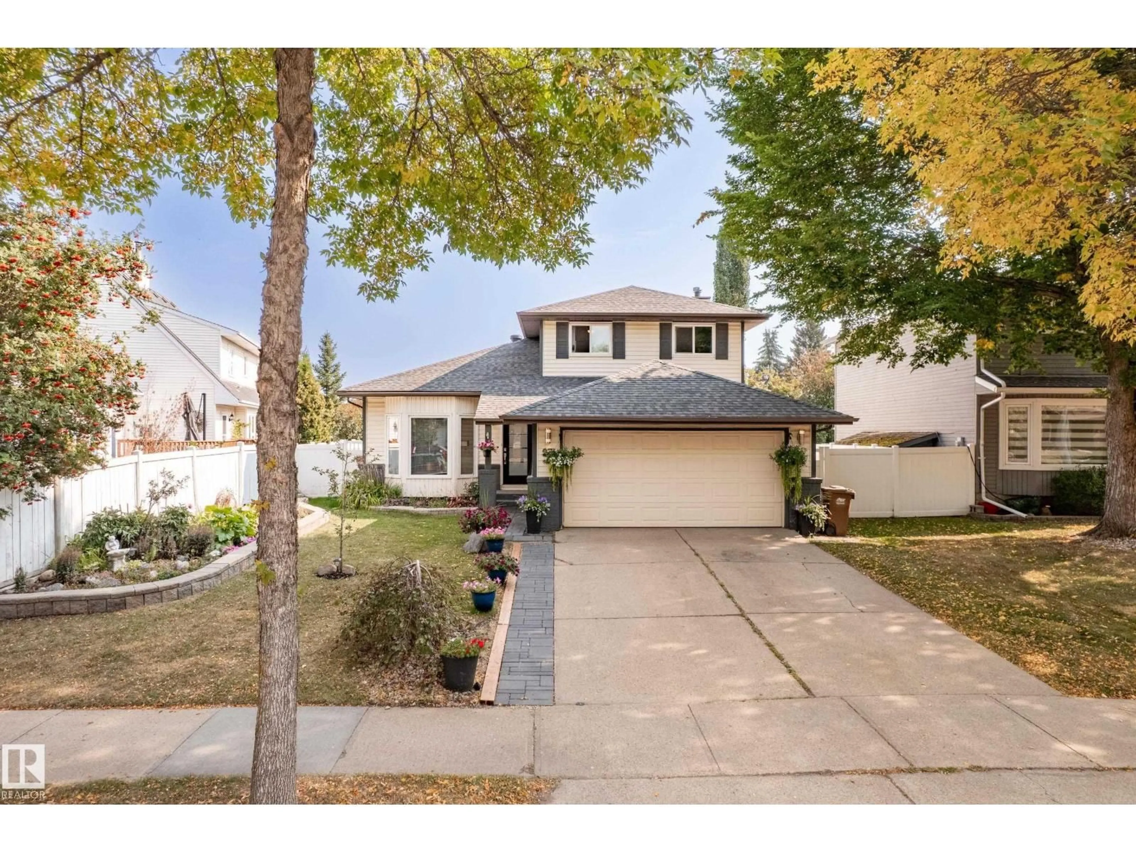 Home with vinyl exterior material, street for 27 PAGE DR, St. Albert Alberta T8N4S8