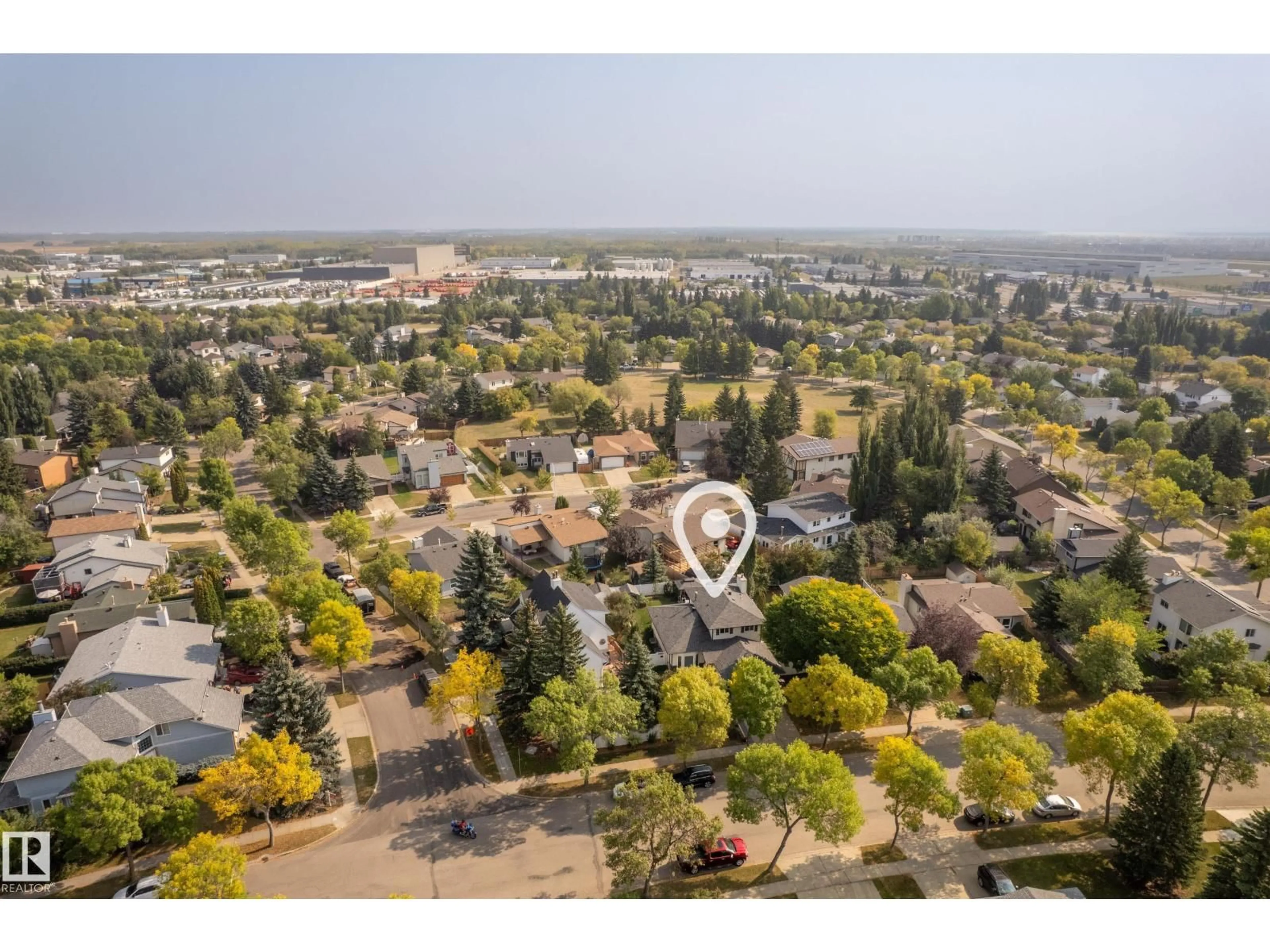 A pic from outside/outdoor area/front of a property/back of a property/a pic from drone, unknown for 27 PAGE DR, St. Albert Alberta T8N4S8