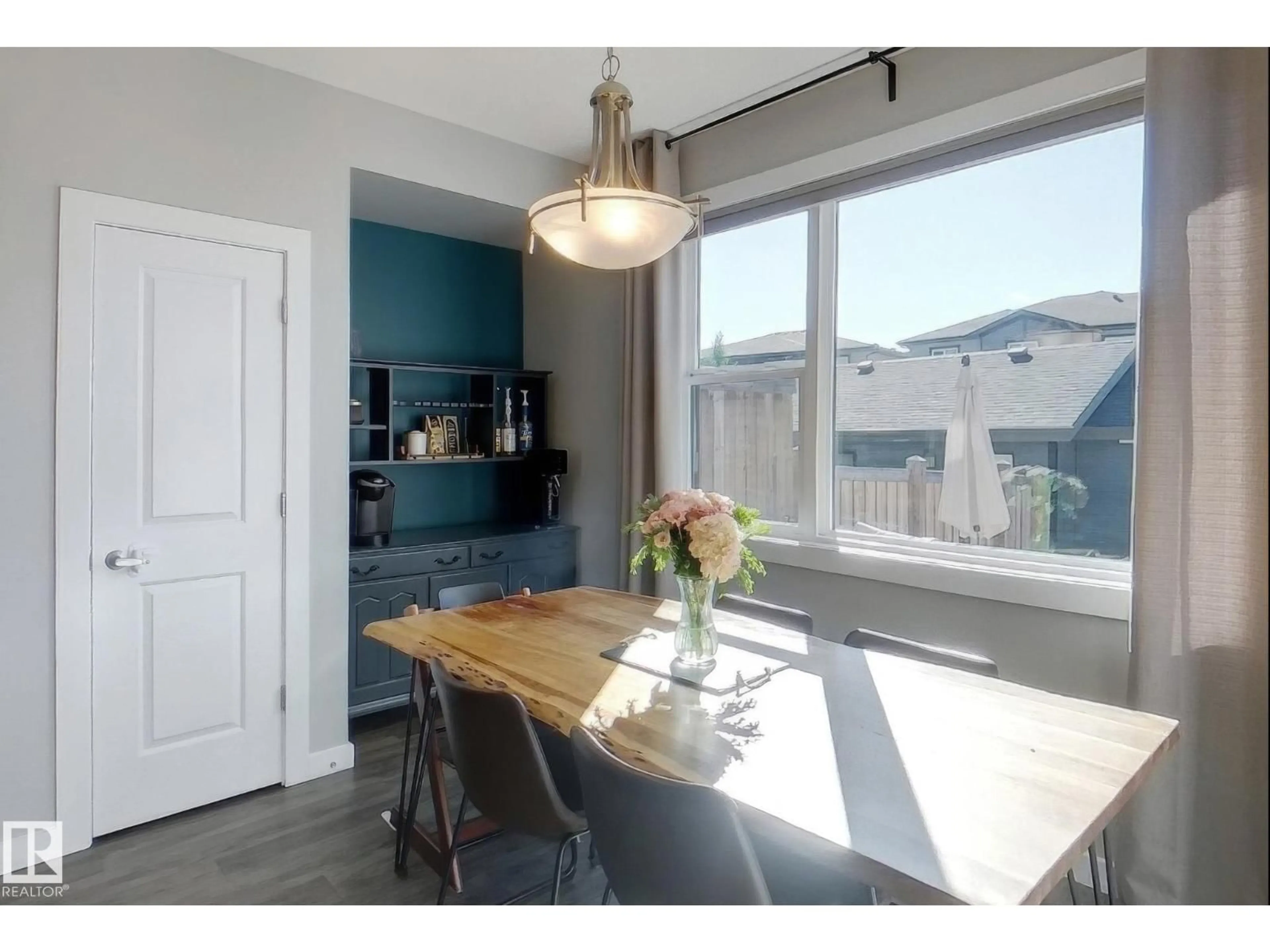 Open concept kitchen, wood/laminate floor for 5191 CHAPPELLE RD, Edmonton Alberta T6W3H3