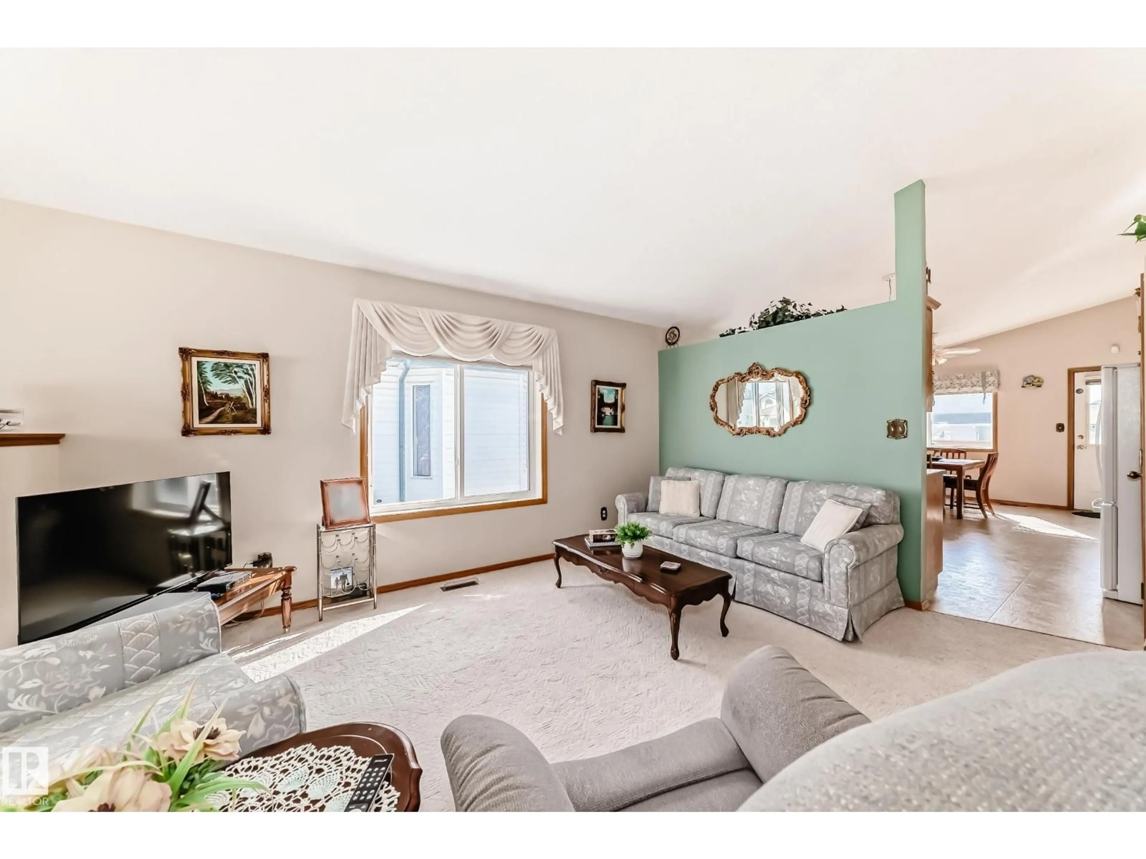 Living room with furniture, unknown for NW - 6727 162 AV, Edmonton Alberta T5Z3C5