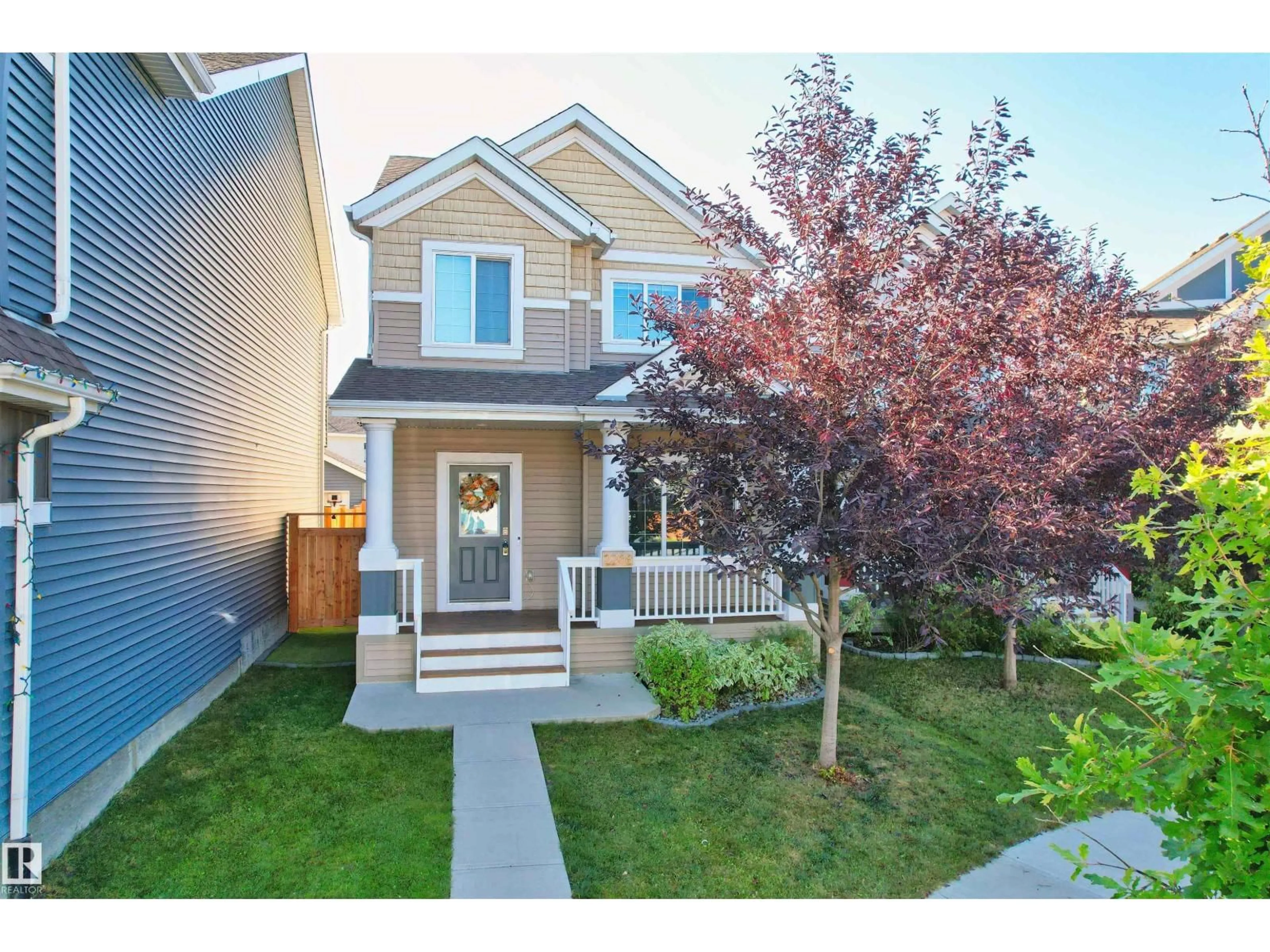 Home with vinyl exterior material, street for SW - 2208 82 ST, Edmonton Alberta T6X2J6