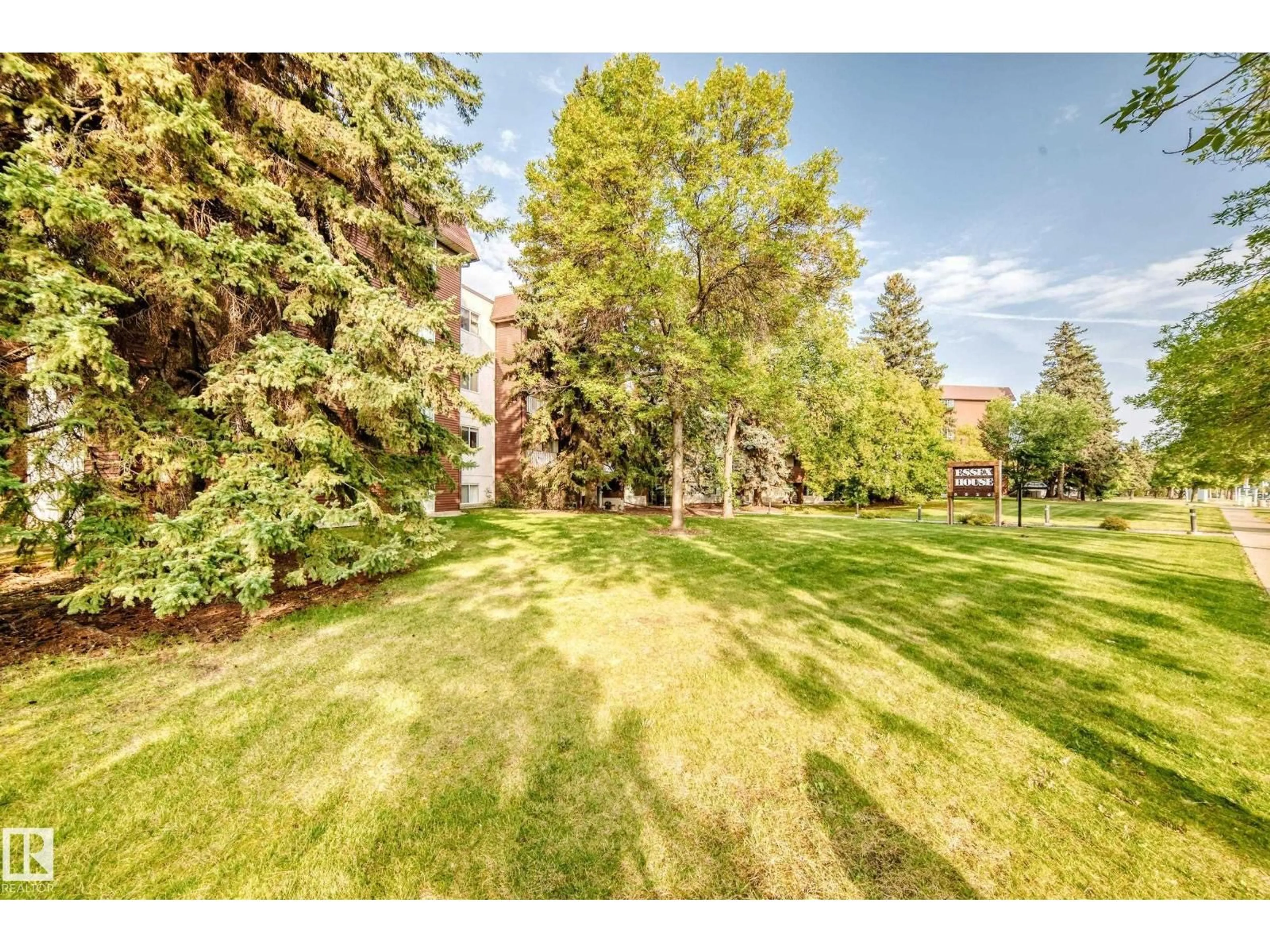 A pic from outside/outdoor area/front of a property/back of a property/a pic from drone, forest/trees view for #416 - 5520 RIVERBEND RD, Edmonton Alberta T6H5G9