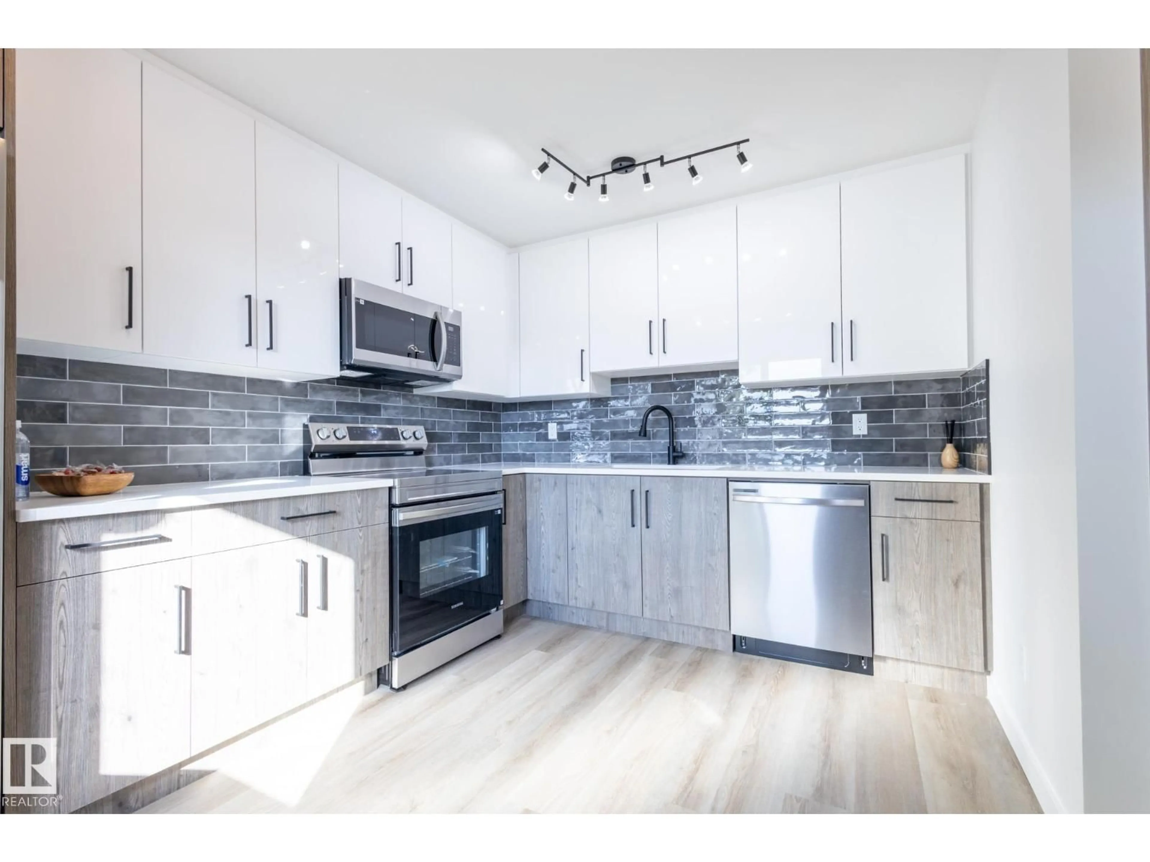 Open concept kitchen, wood/laminate floor for 193 ROSELAND VG, Edmonton Alberta T5E5R6