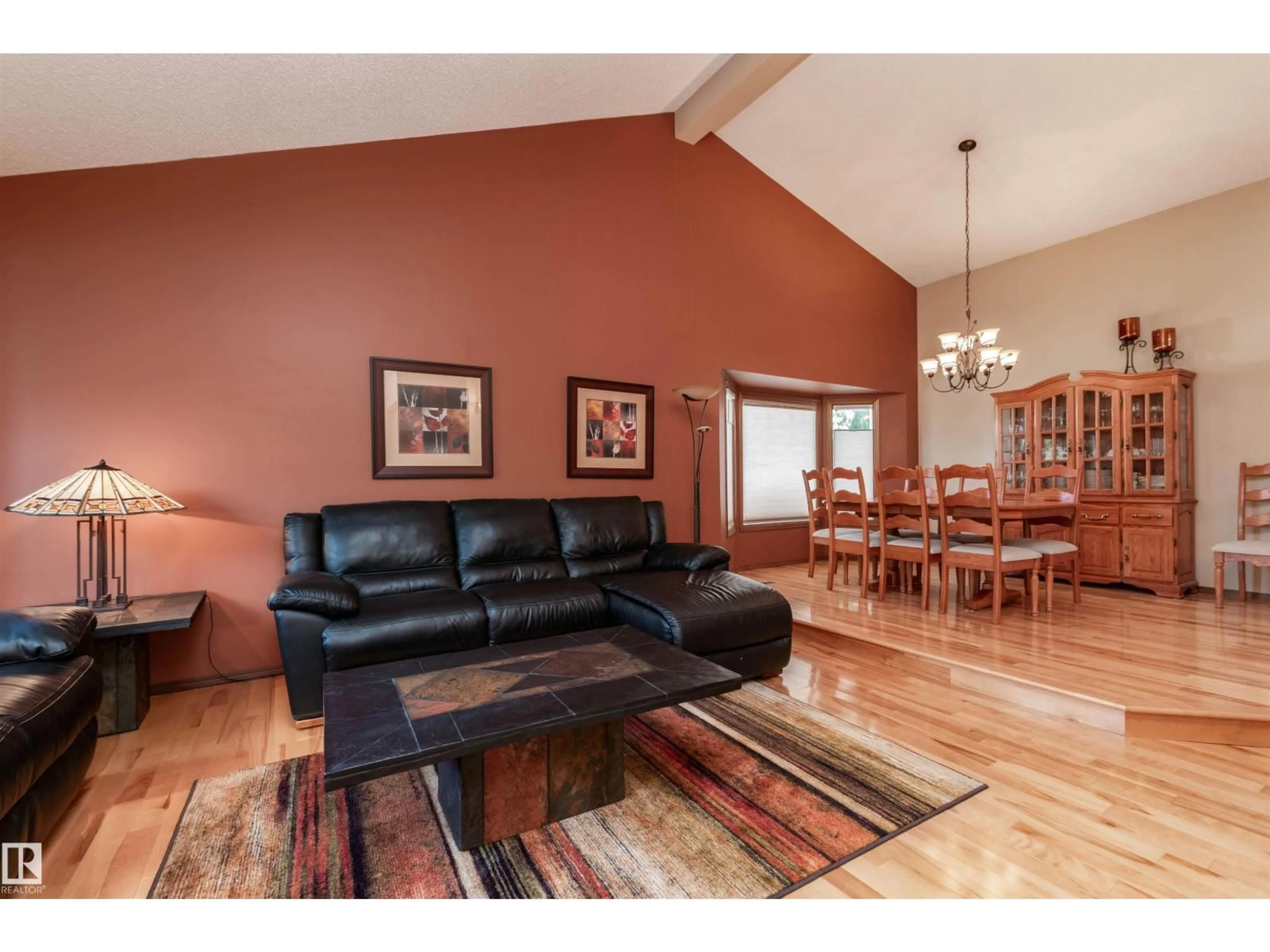 Living room with furniture, wood/laminate floor for 695 MEADOWVIEW DR, Sherwood Park Alberta T8H1G2