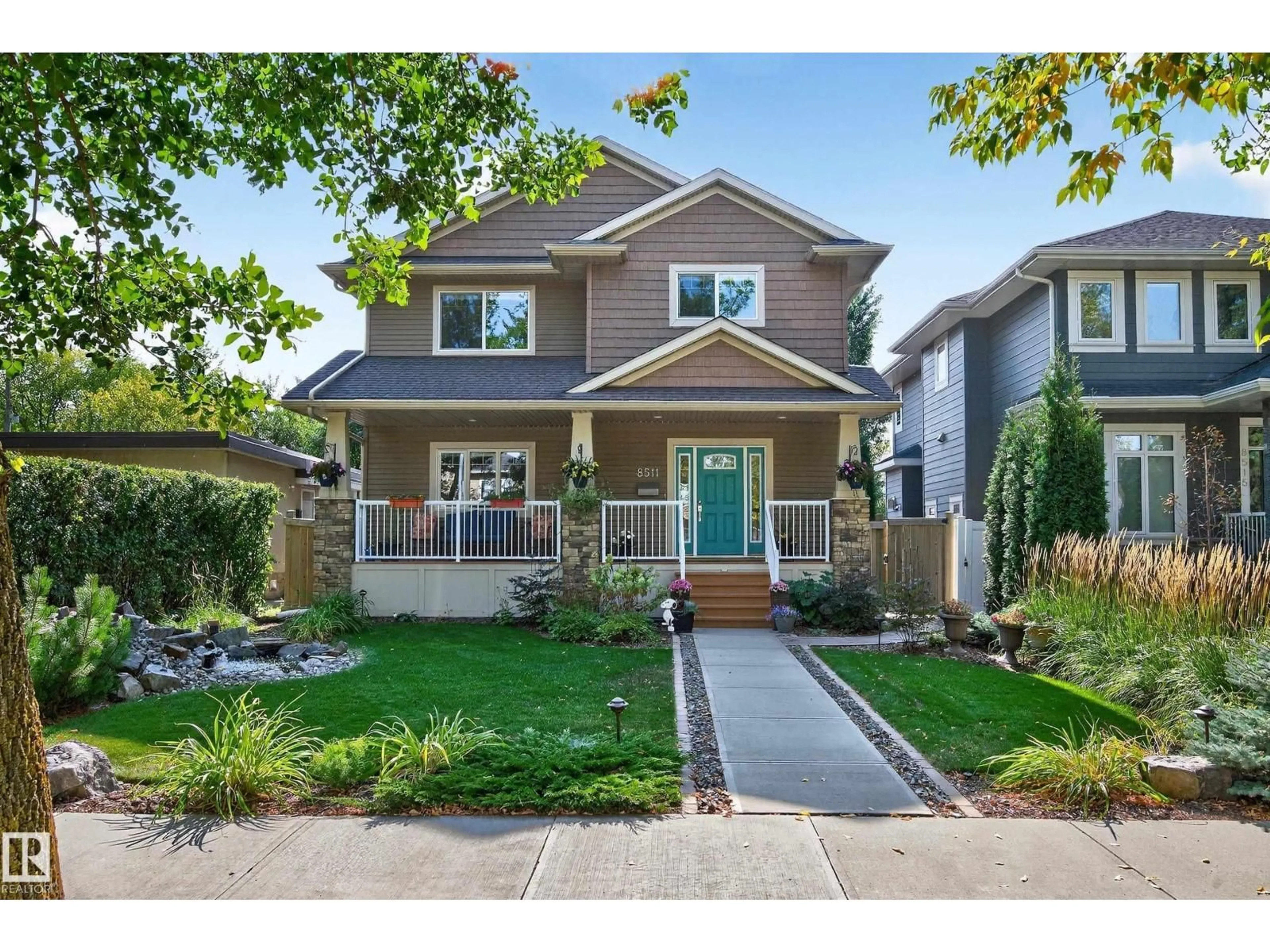 Home with vinyl exterior material, street for 8511 80 AV, Edmonton Alberta T6C0T2