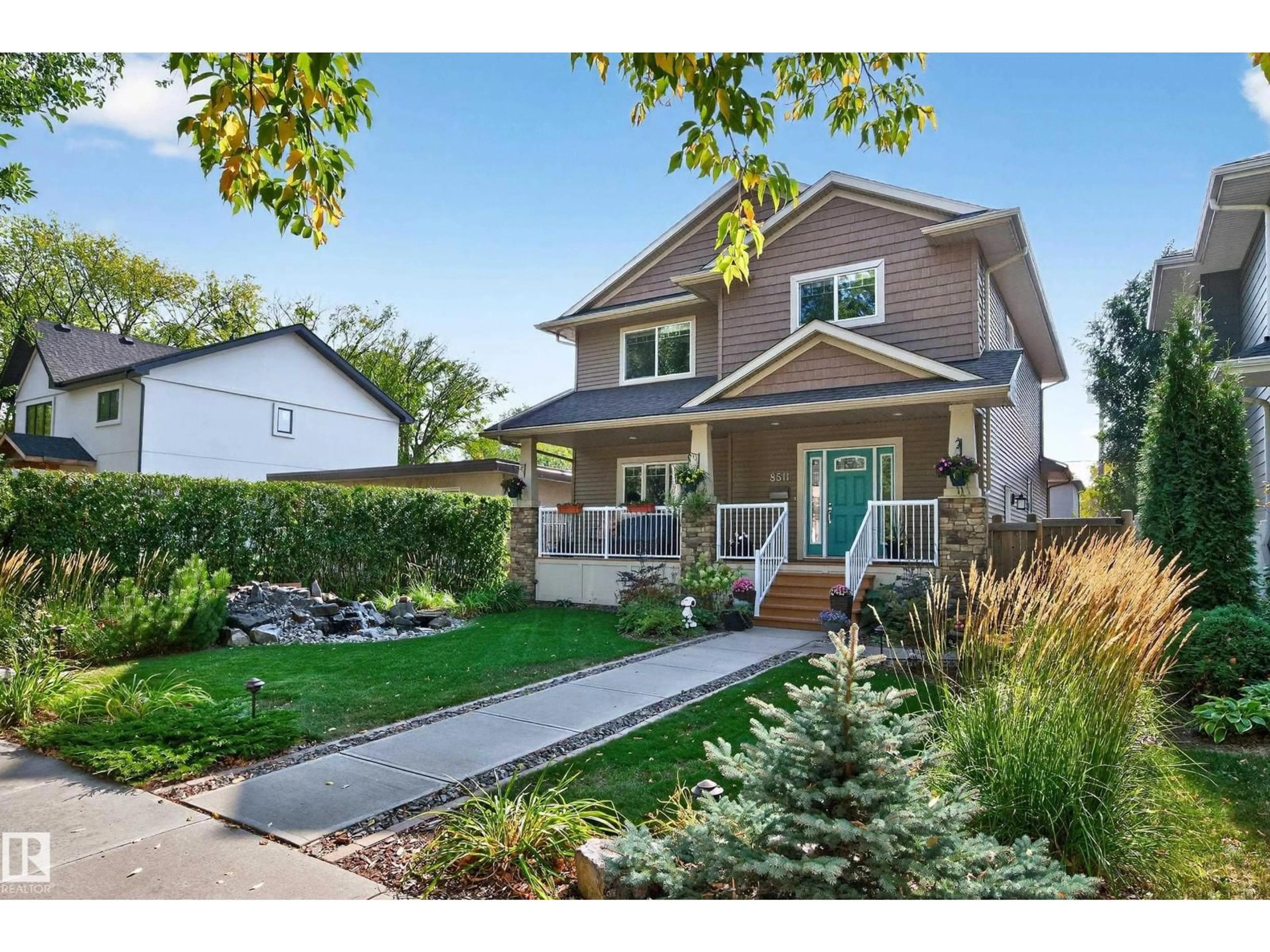 Home with vinyl exterior material, street for 8511 80 AV, Edmonton Alberta T6C0T2