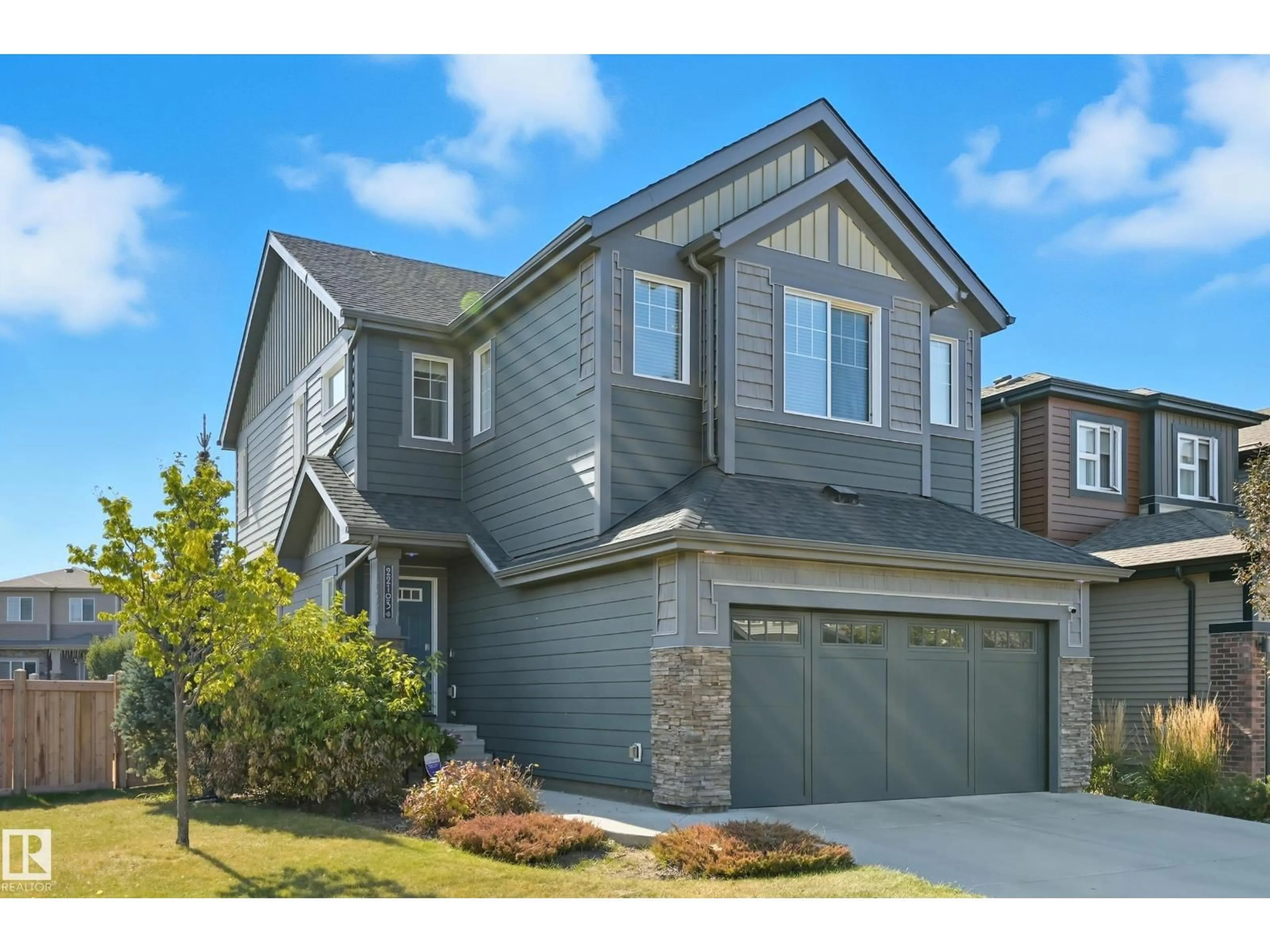 Home with vinyl exterior material, street for 22103 87 AV, Edmonton Alberta T5T7H7