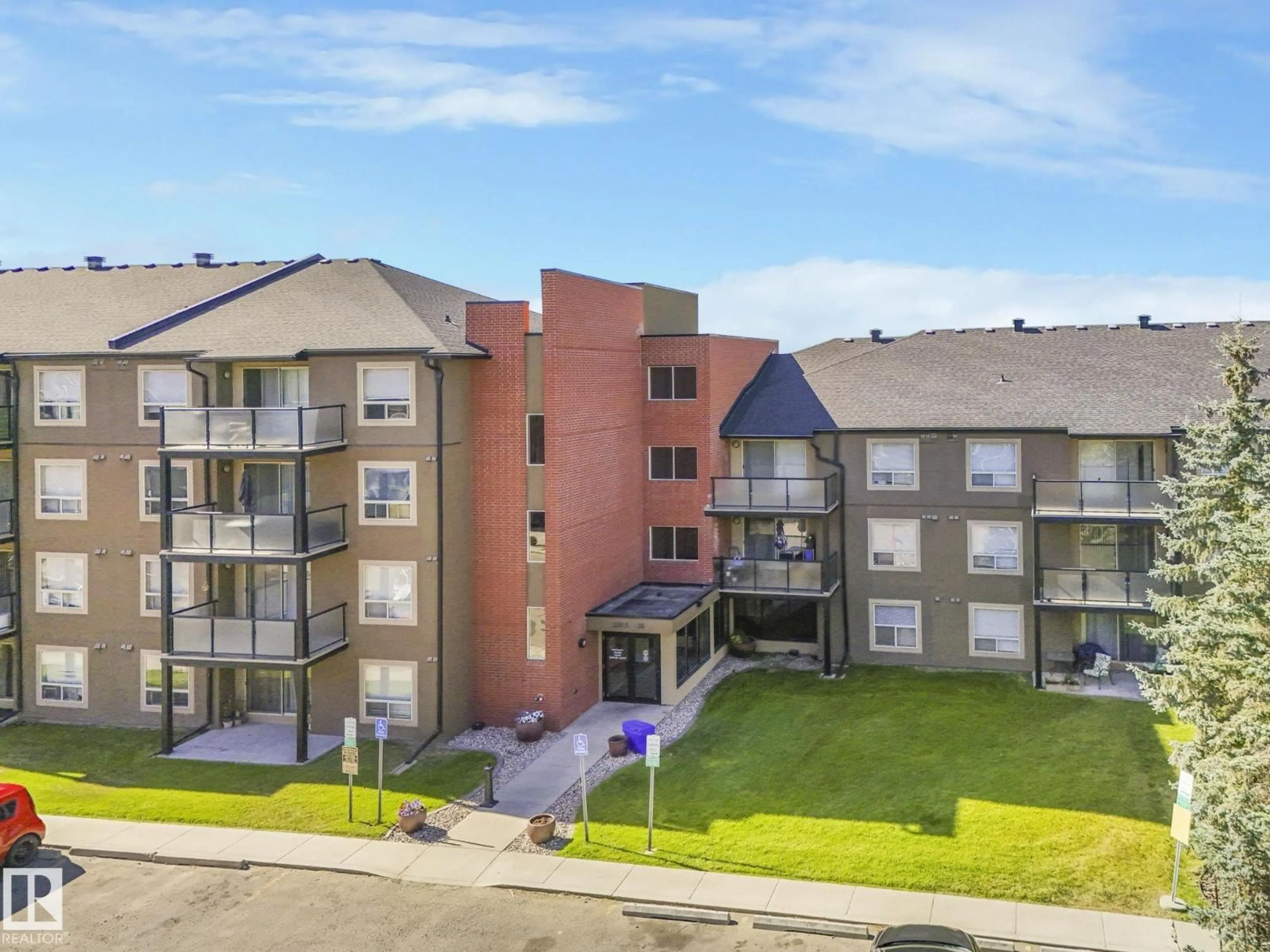 A pic from outside/outdoor area/front of a property/back of a property/a pic from drone, building for 206 - 13908 136 ST NW, Edmonton Alberta T6V1Y4