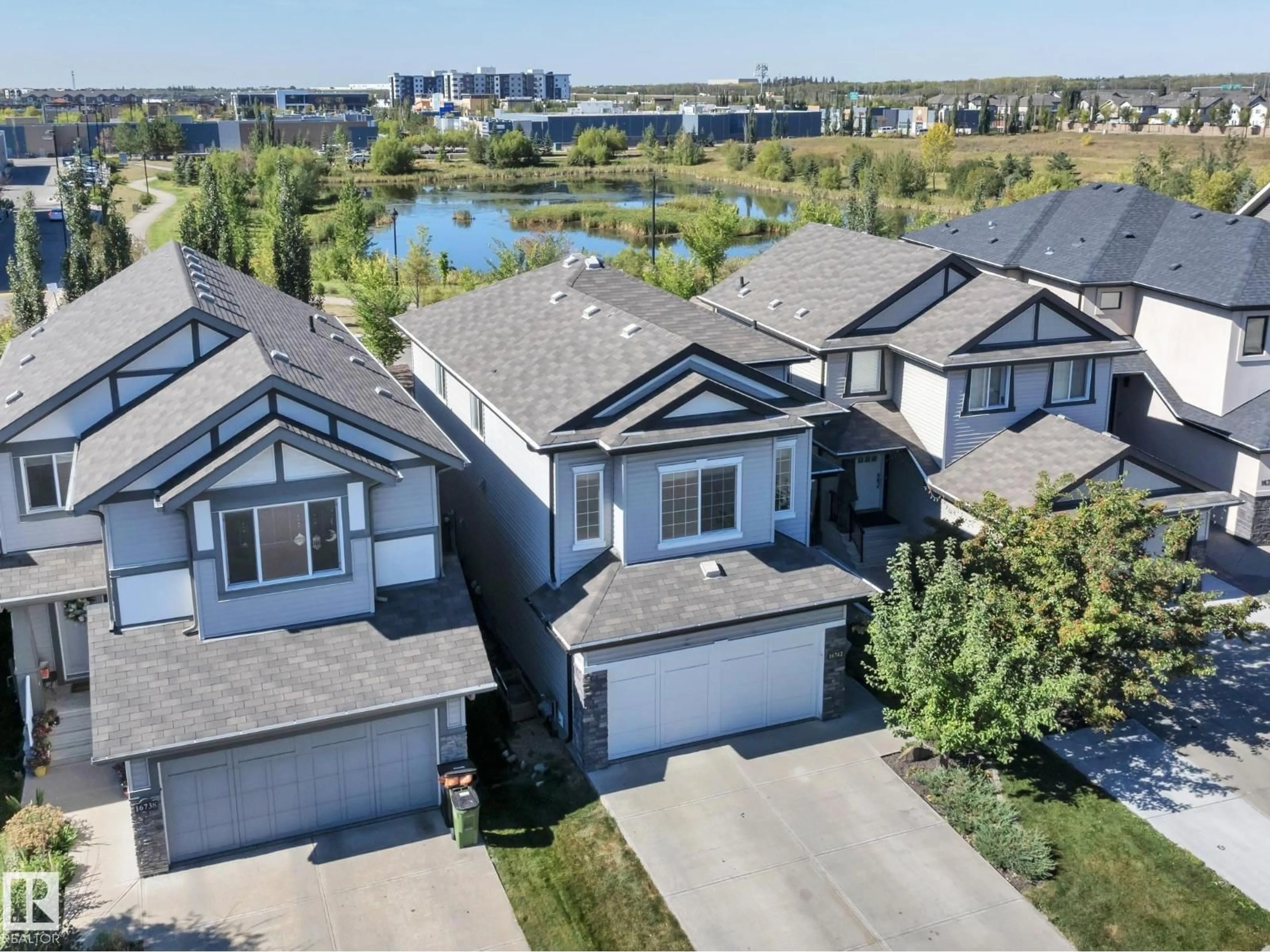 A pic from outside/outdoor area/front of a property/back of a property/a pic from drone, water/lake/river/ocean view for NW - 16742 122A ST, Edmonton Alberta T5X0G3