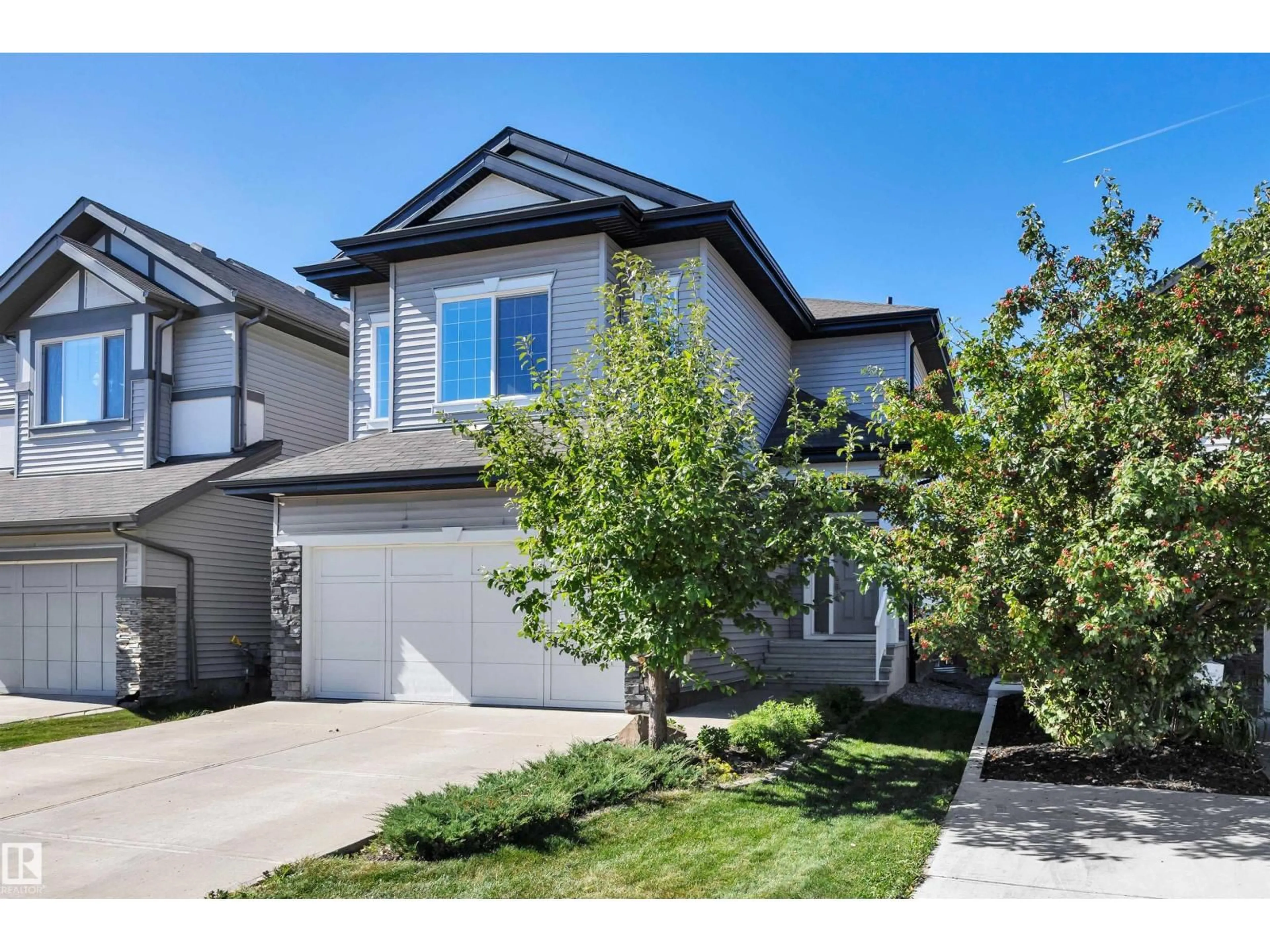Home with vinyl exterior material, street for NW - 16742 122A ST, Edmonton Alberta T5X0G3