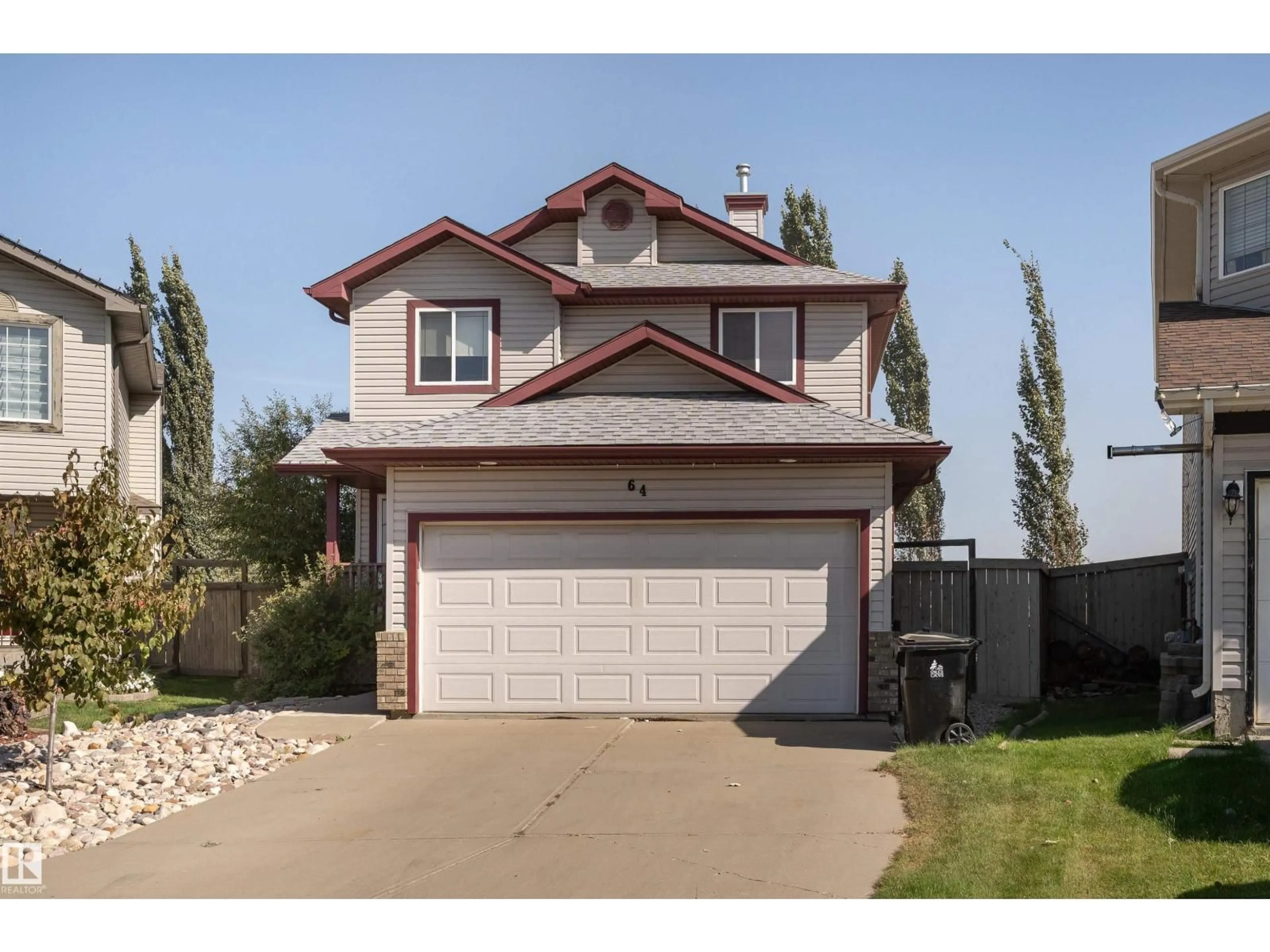 Home with vinyl exterior material, street for 64 LEYLAND WY, Spruce Grove Alberta T7X4P2