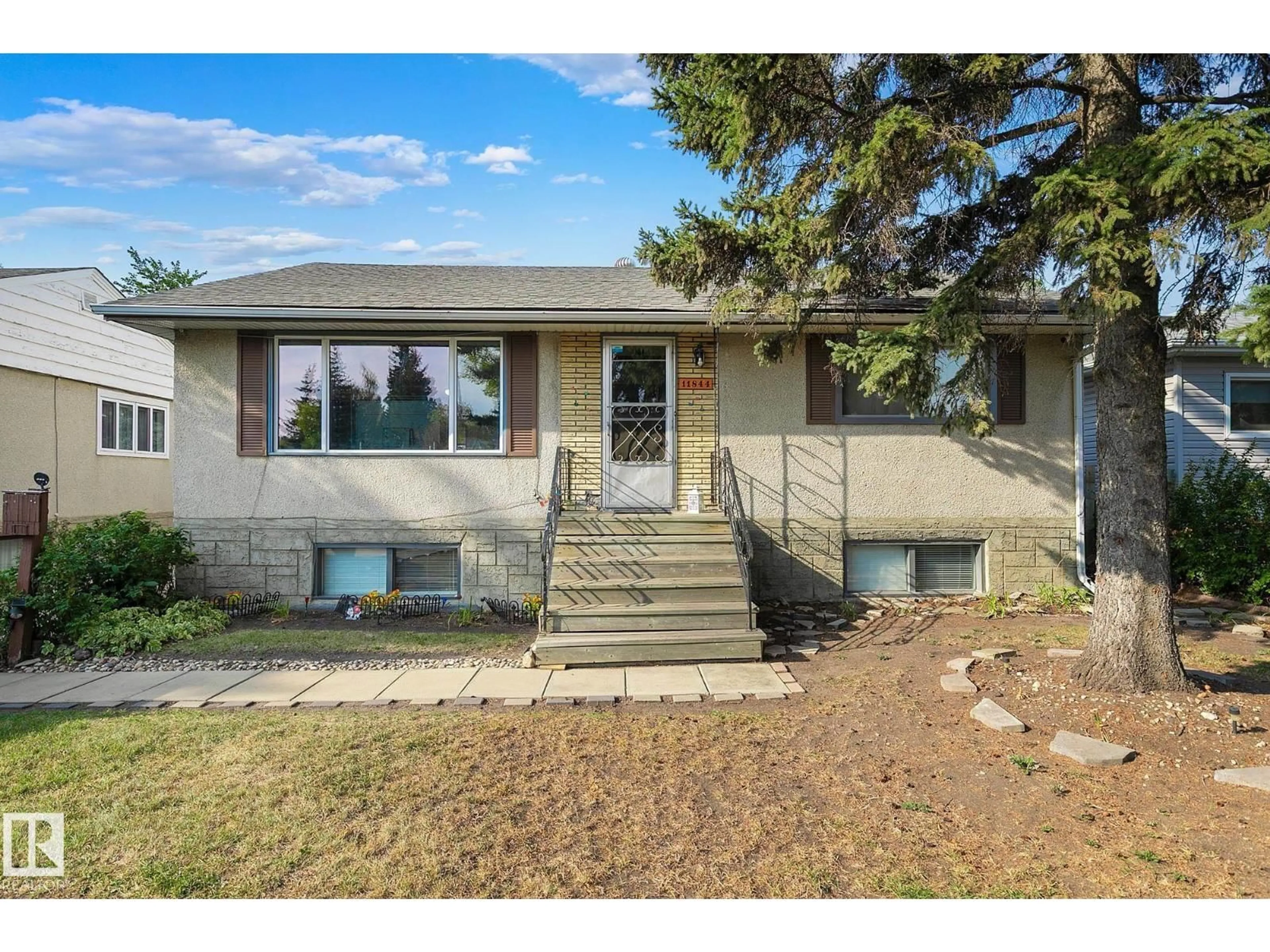 Home with vinyl exterior material, street for 11844 ST ALBERT TR, Edmonton Alberta T5L4G4