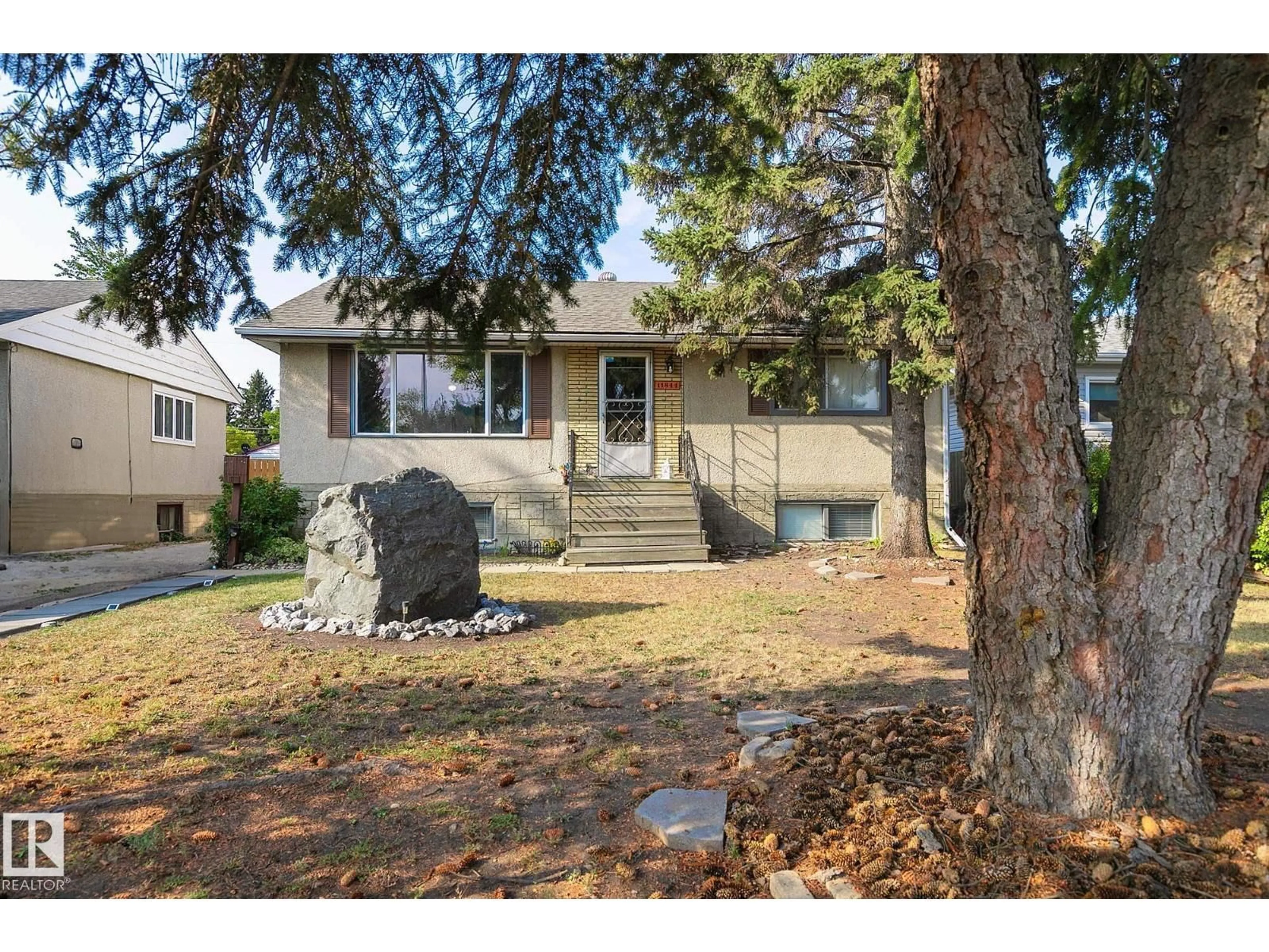 Home with vinyl exterior material, street for 11844 ST ALBERT TR, Edmonton Alberta T5L4G4