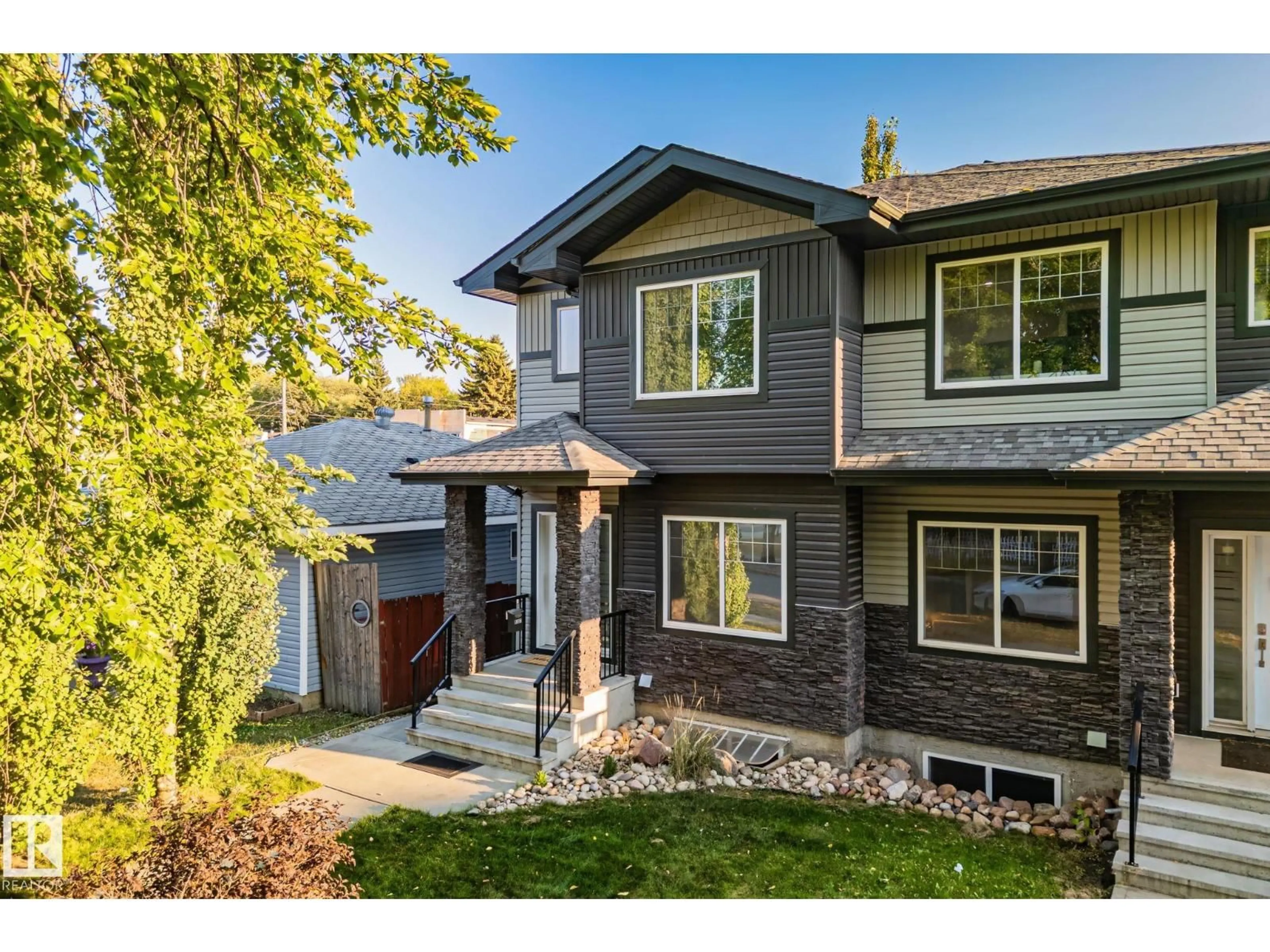 Home with vinyl exterior material, street for 8307 81 AV, Edmonton Alberta T6C0W1