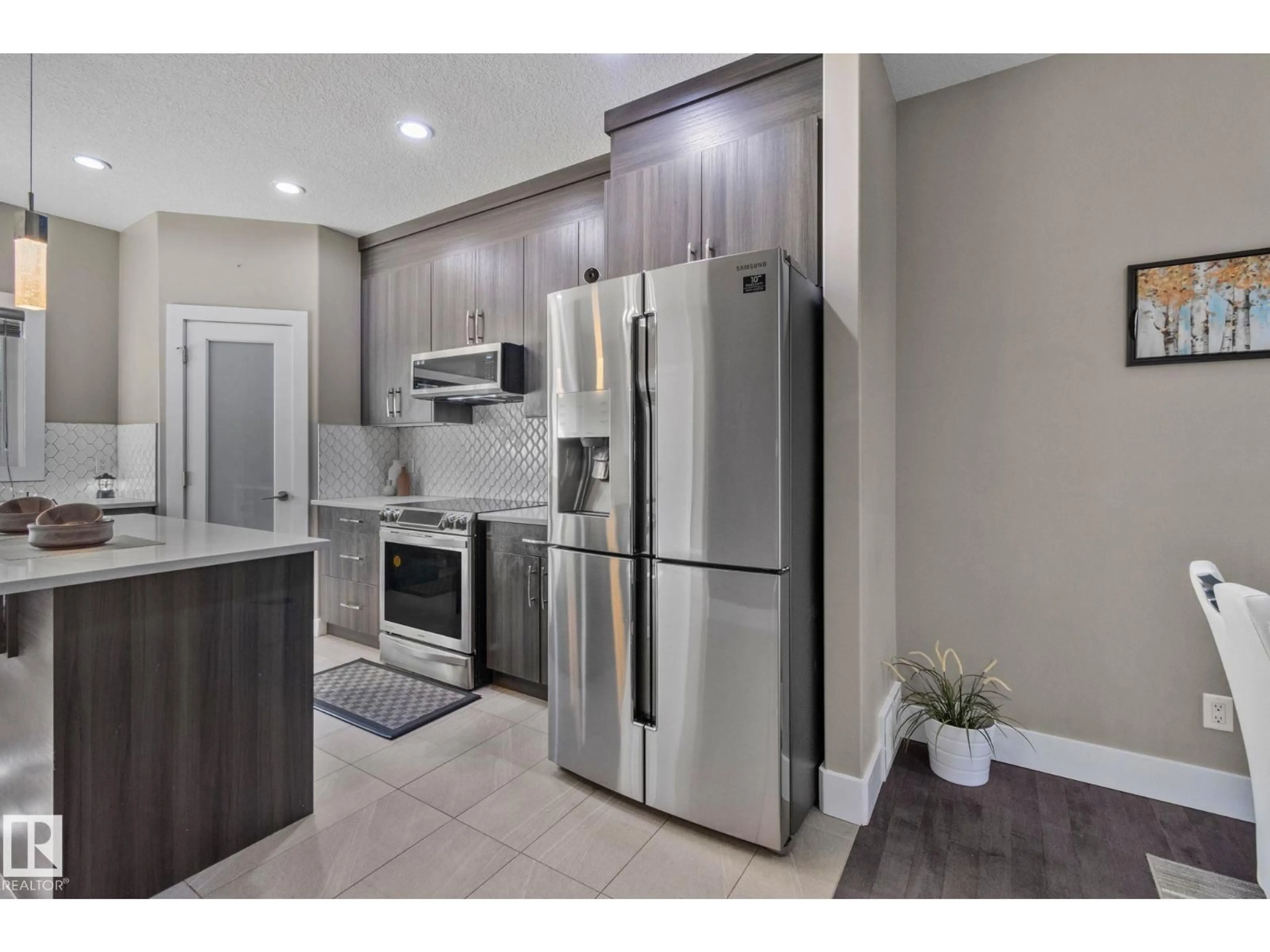 Open concept kitchen, unknown for 8307 81 AV, Edmonton Alberta T6C0W1