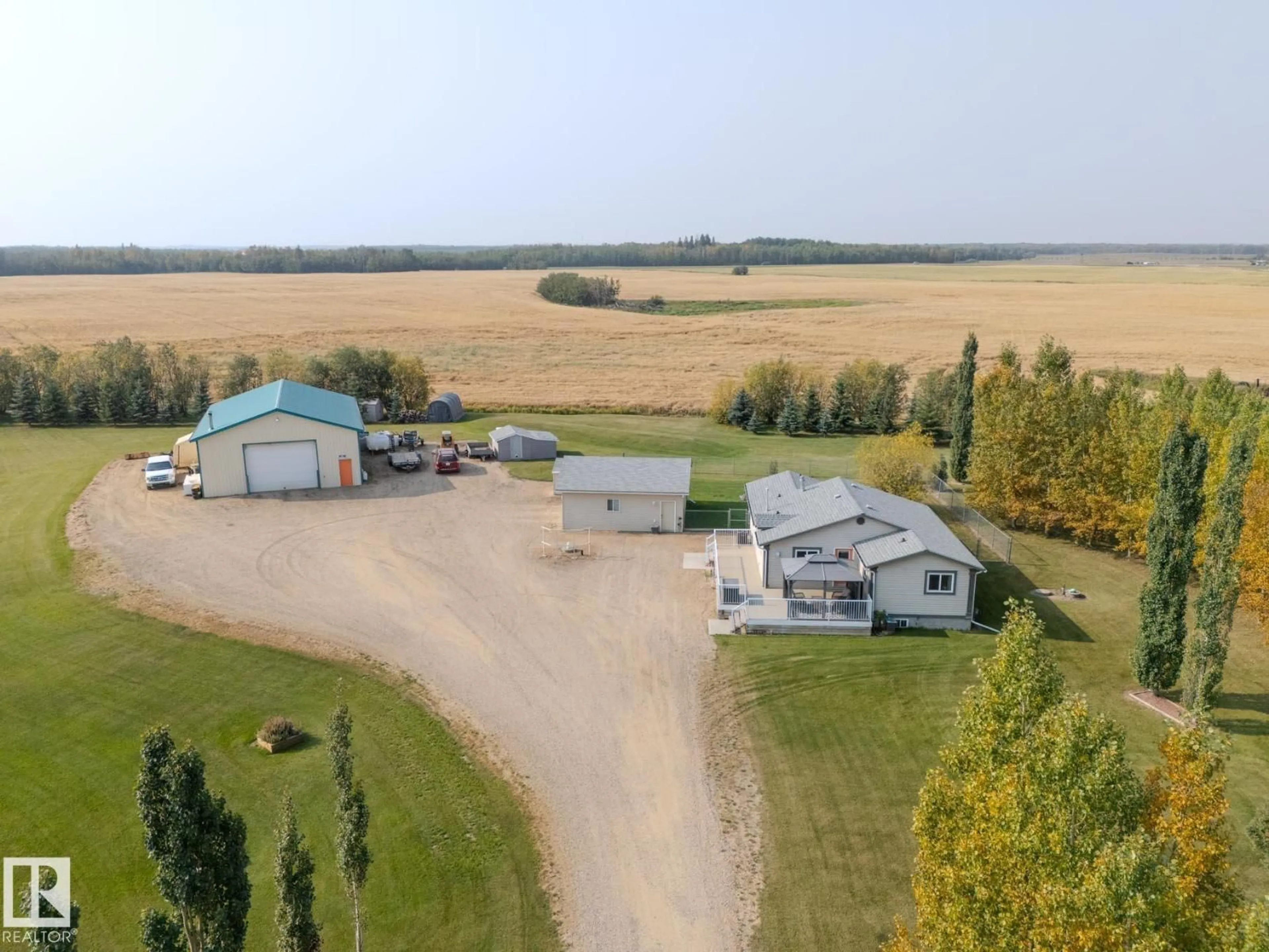 A pic from outside/outdoor area/front of a property/back of a property/a pic from drone, building for B - 23021 TWP ROAD 502, Rural Leduc County Alberta T0B3M1