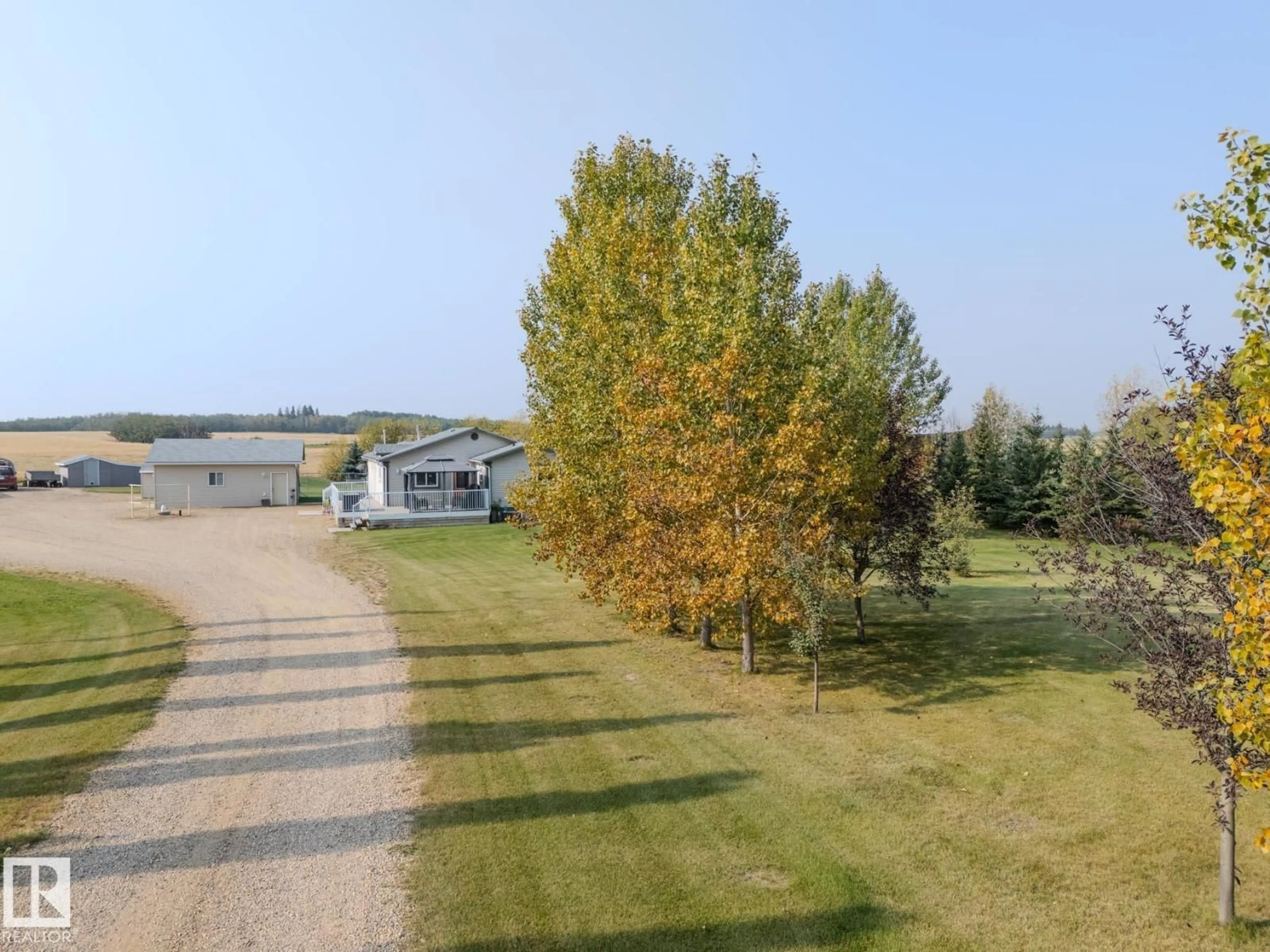 A pic from outside/outdoor area/front of a property/back of a property/a pic from drone, unknown for B - 23021 TWP ROAD 502, Rural Leduc County Alberta T0B3M1