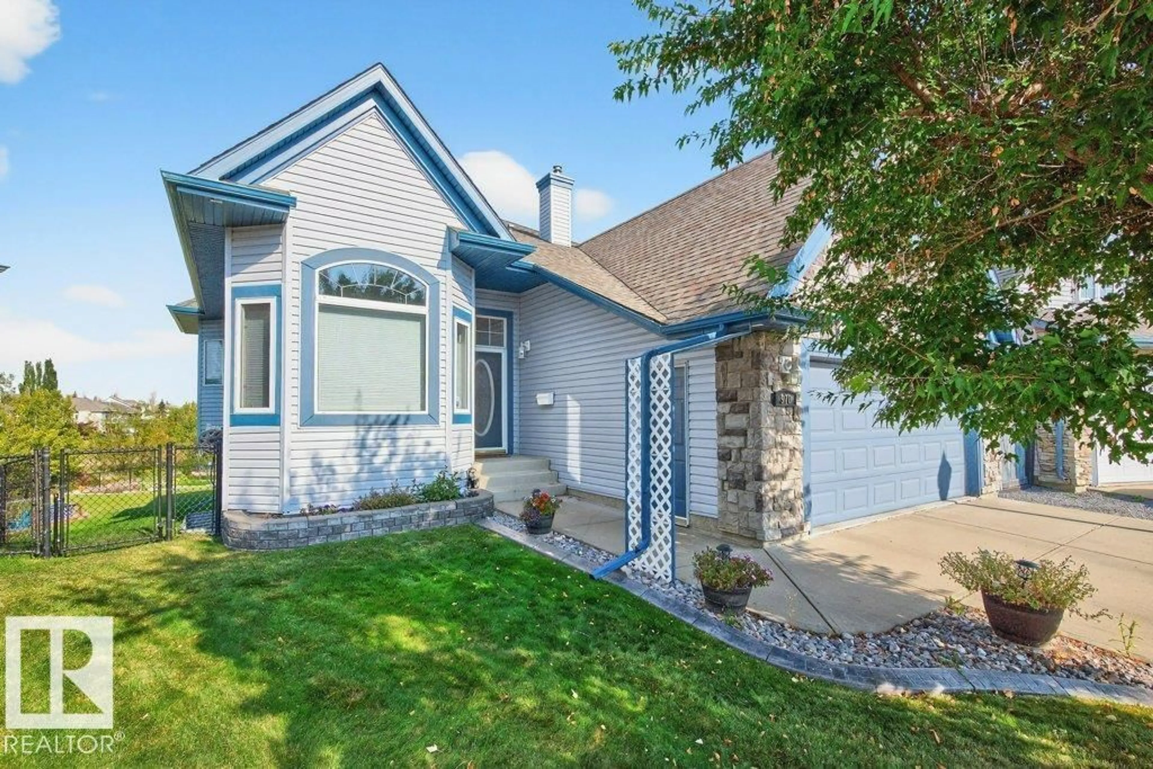 Home with vinyl exterior material, water/lake/river/ocean view for 970 BLACKMUD CREEK CR, Edmonton Alberta T6W1J7