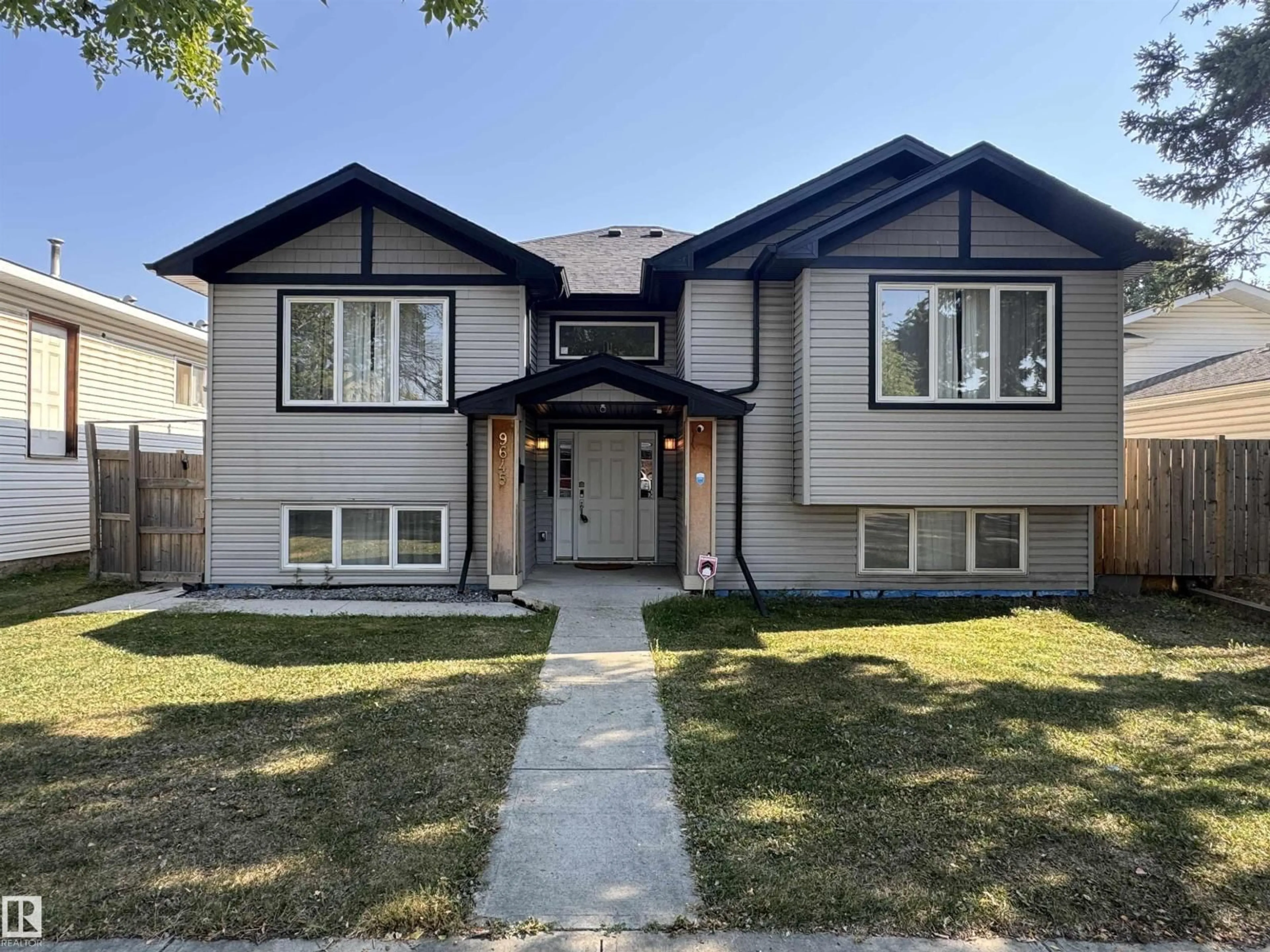 Home with vinyl exterior material, street for 9645 150 ST, Edmonton Alberta T5P1N2