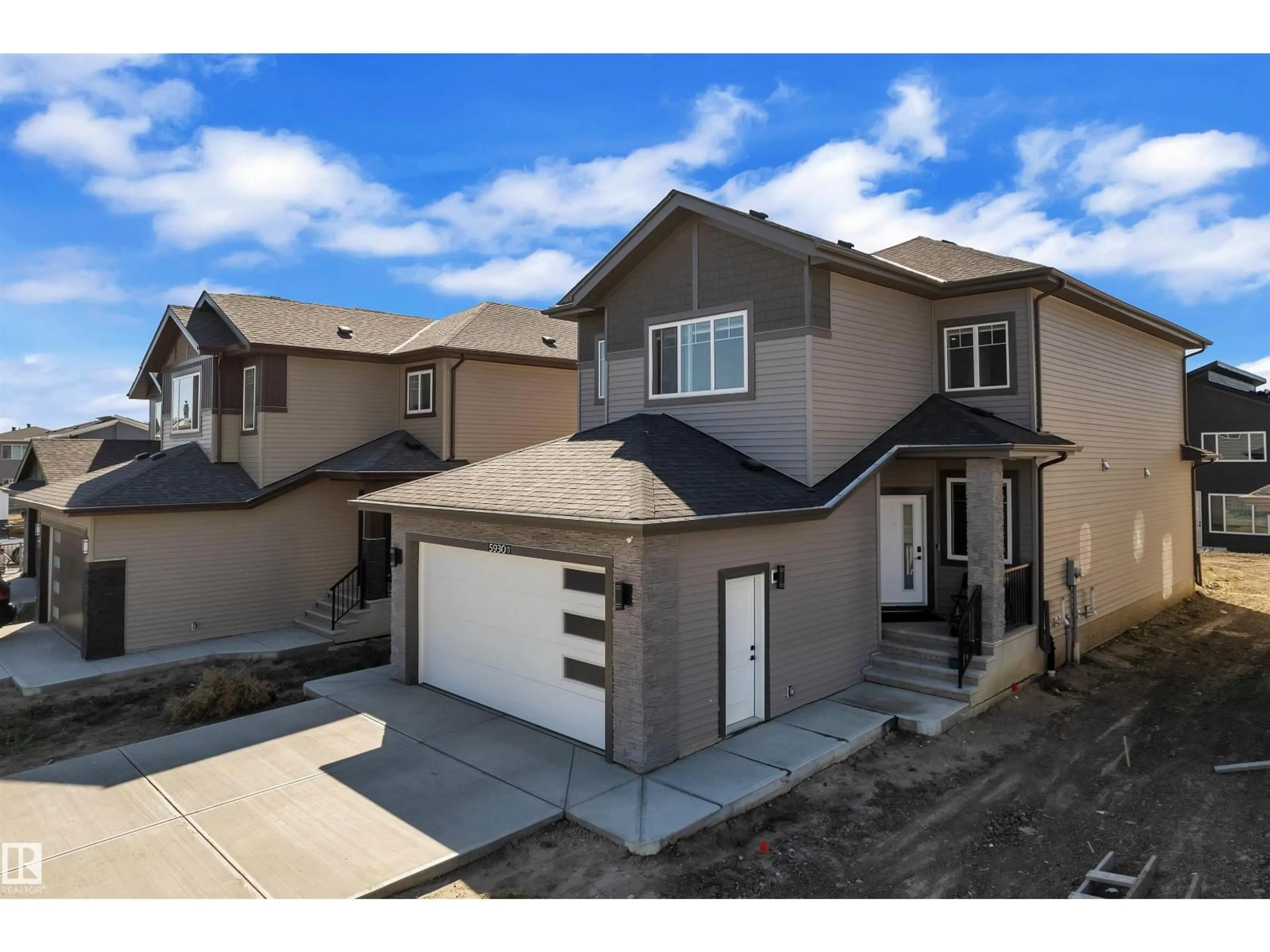 Home with vinyl exterior material, street for 5930 18 ST, Rural Leduc County Alberta T4X3C5