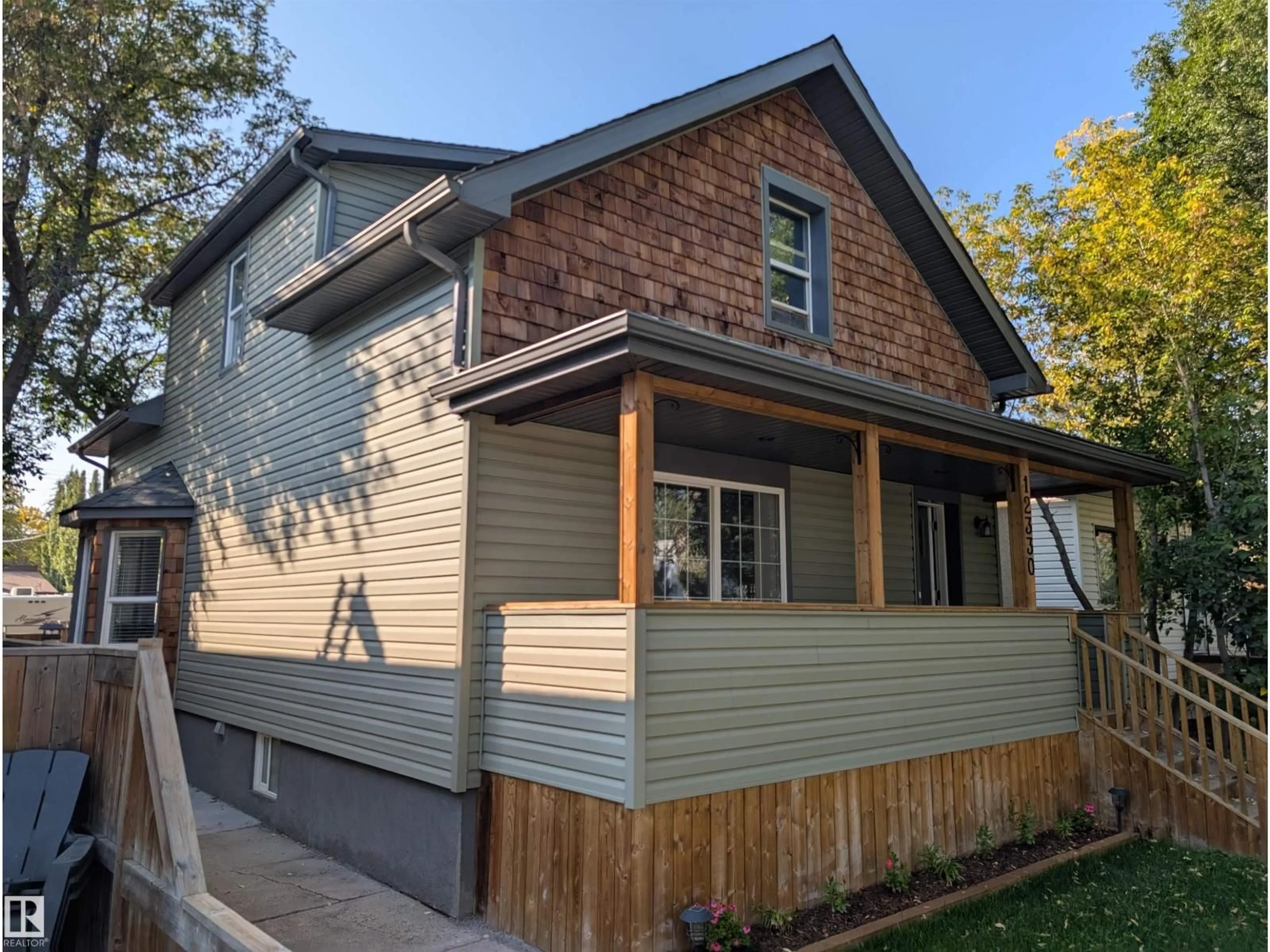 Home with vinyl exterior material, street for NW - 12330 85 ST, Edmonton Alberta T5B3G9