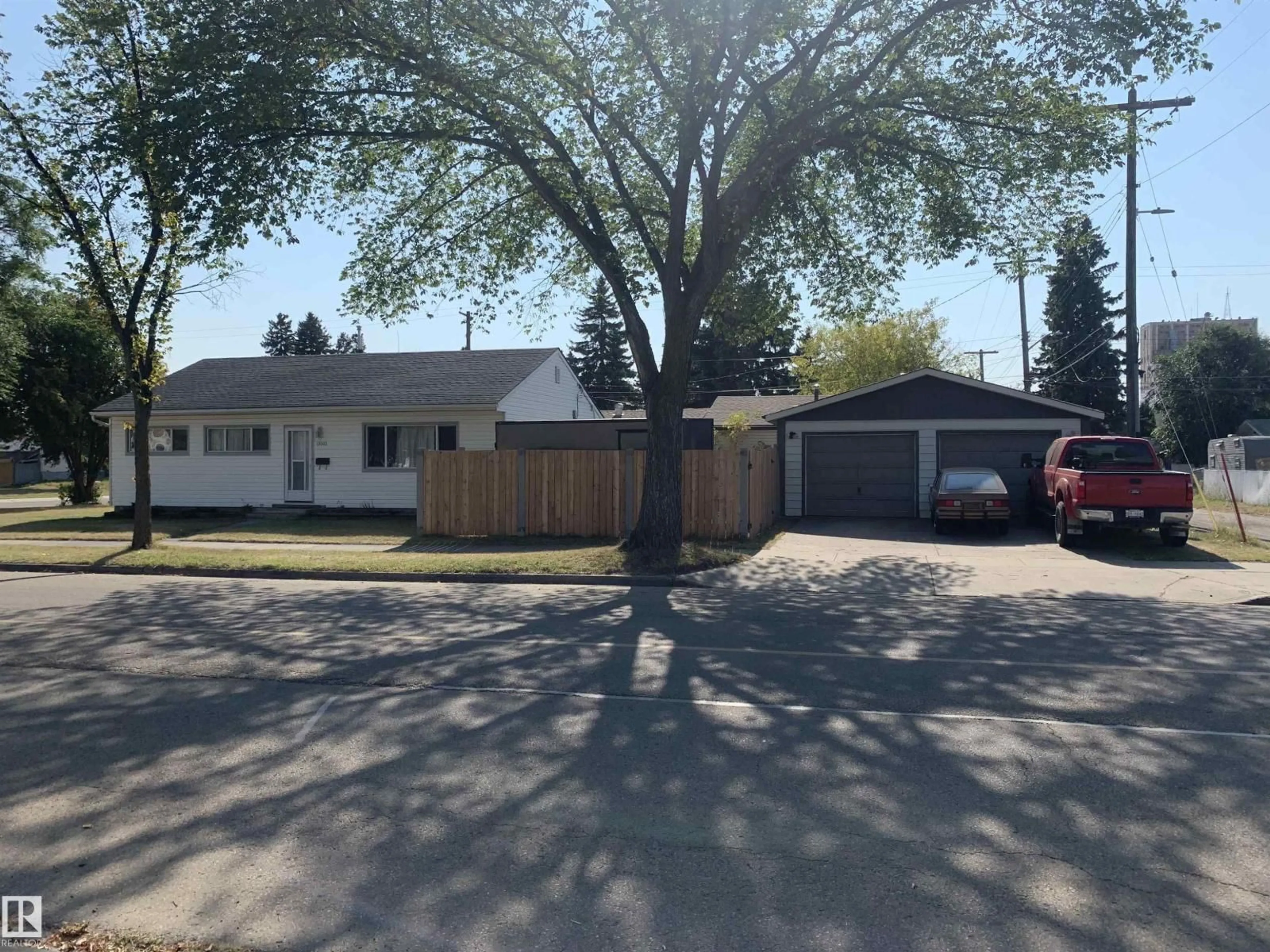 A pic from outside/outdoor area/front of a property/back of a property/a pic from drone, street for 13003 129 AV, Edmonton Alberta T5L3K1