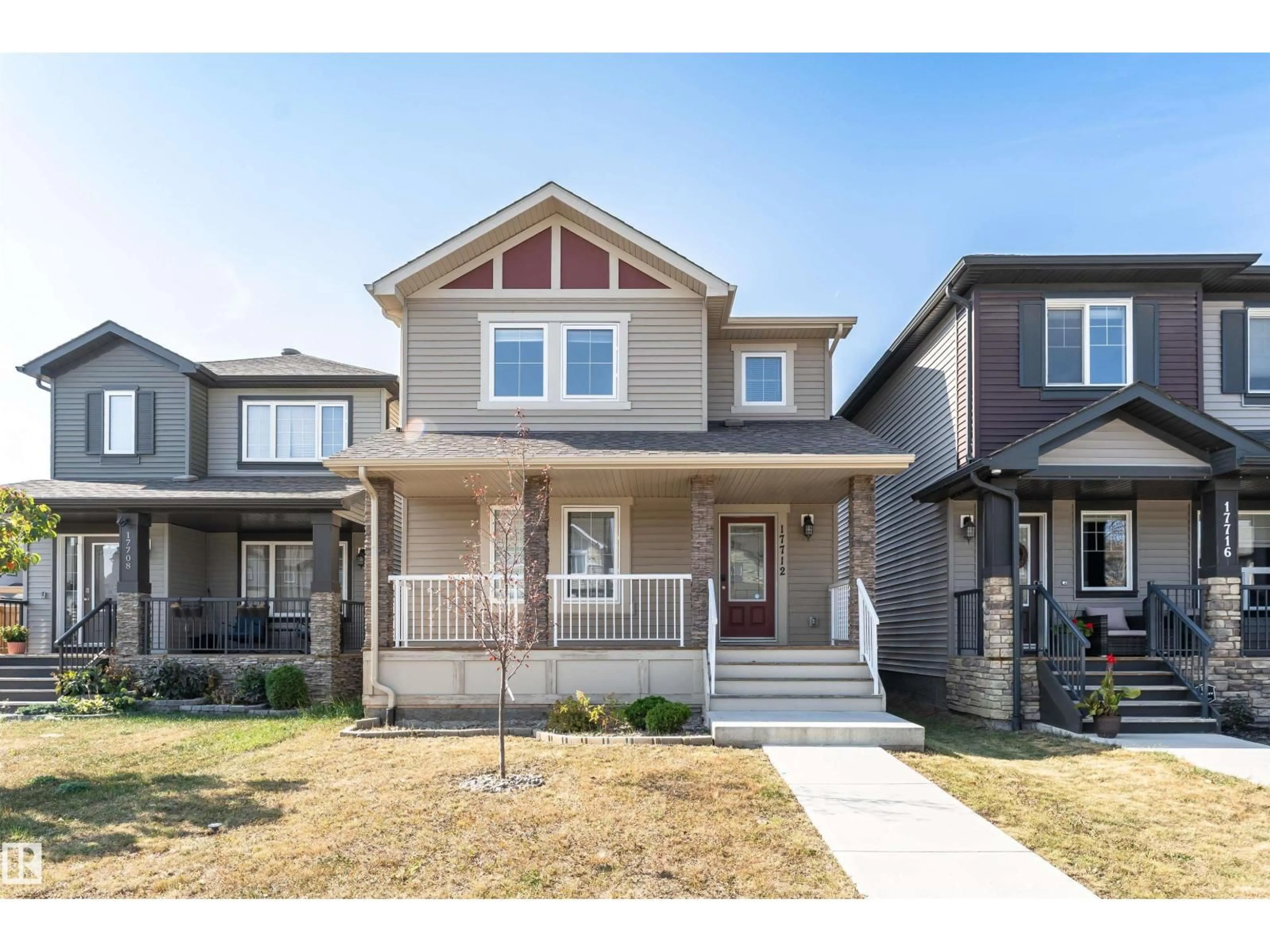 Home with vinyl exterior material, street for 17712 64 NW, Edmonton Alberta T5Y3X4